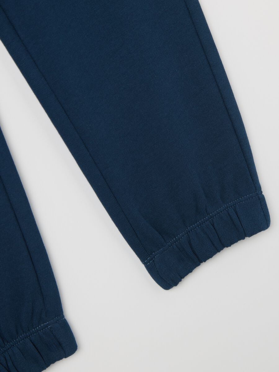 Blue cotton joggers with drawstring and print_3