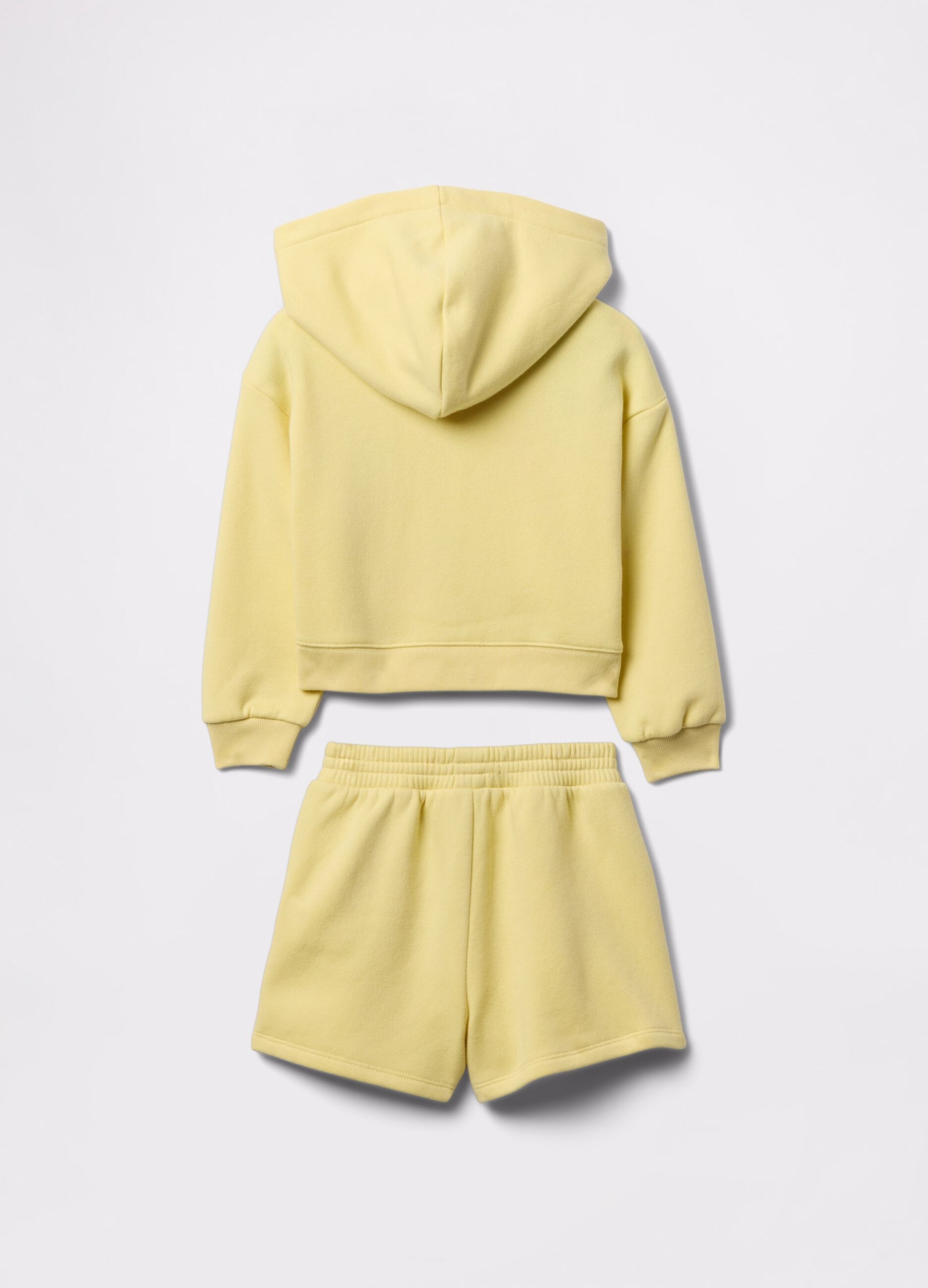 Yellow jogging set with bouclé fruit patch