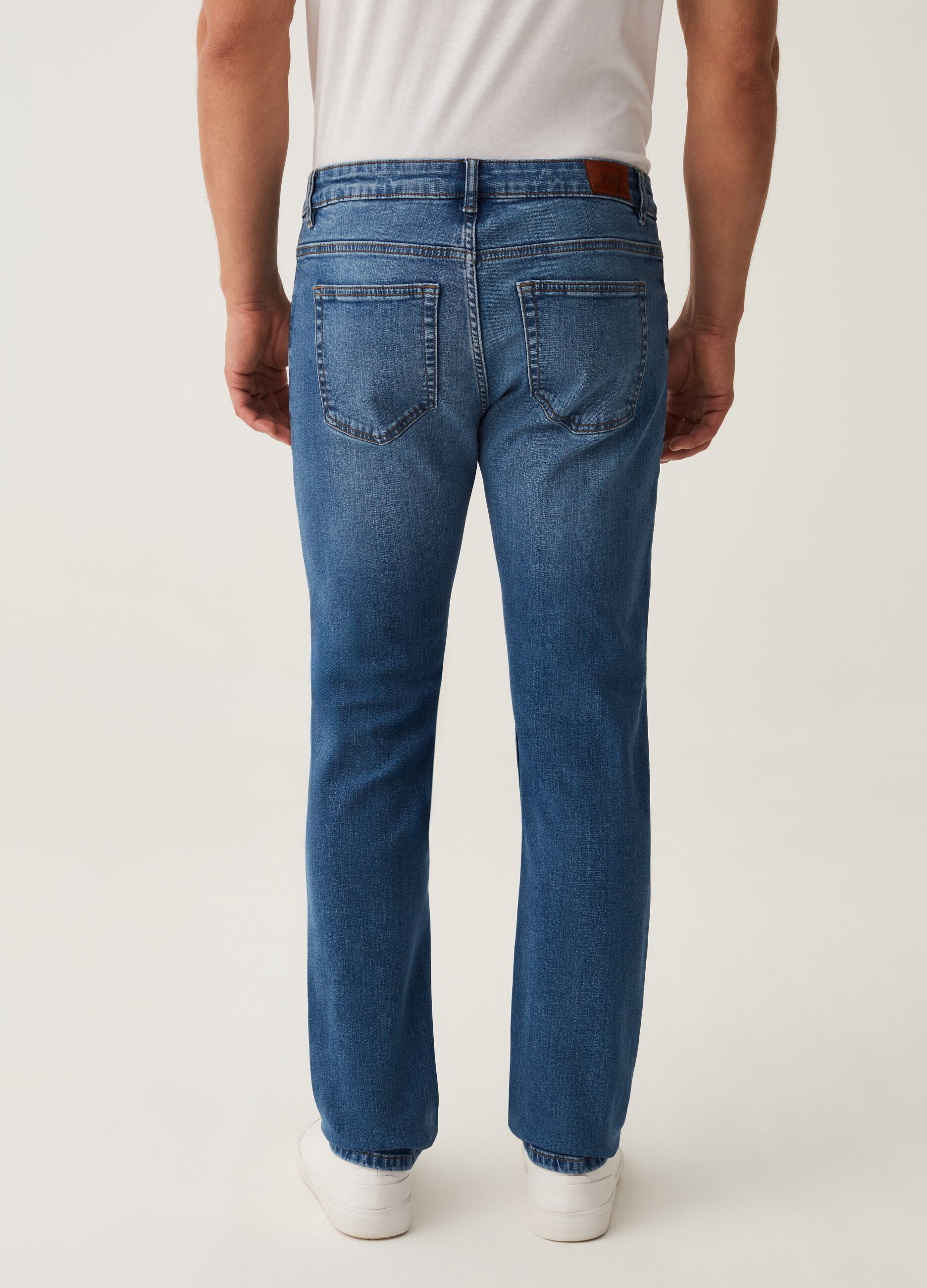 Jeans slim fit con scoloriture_1
