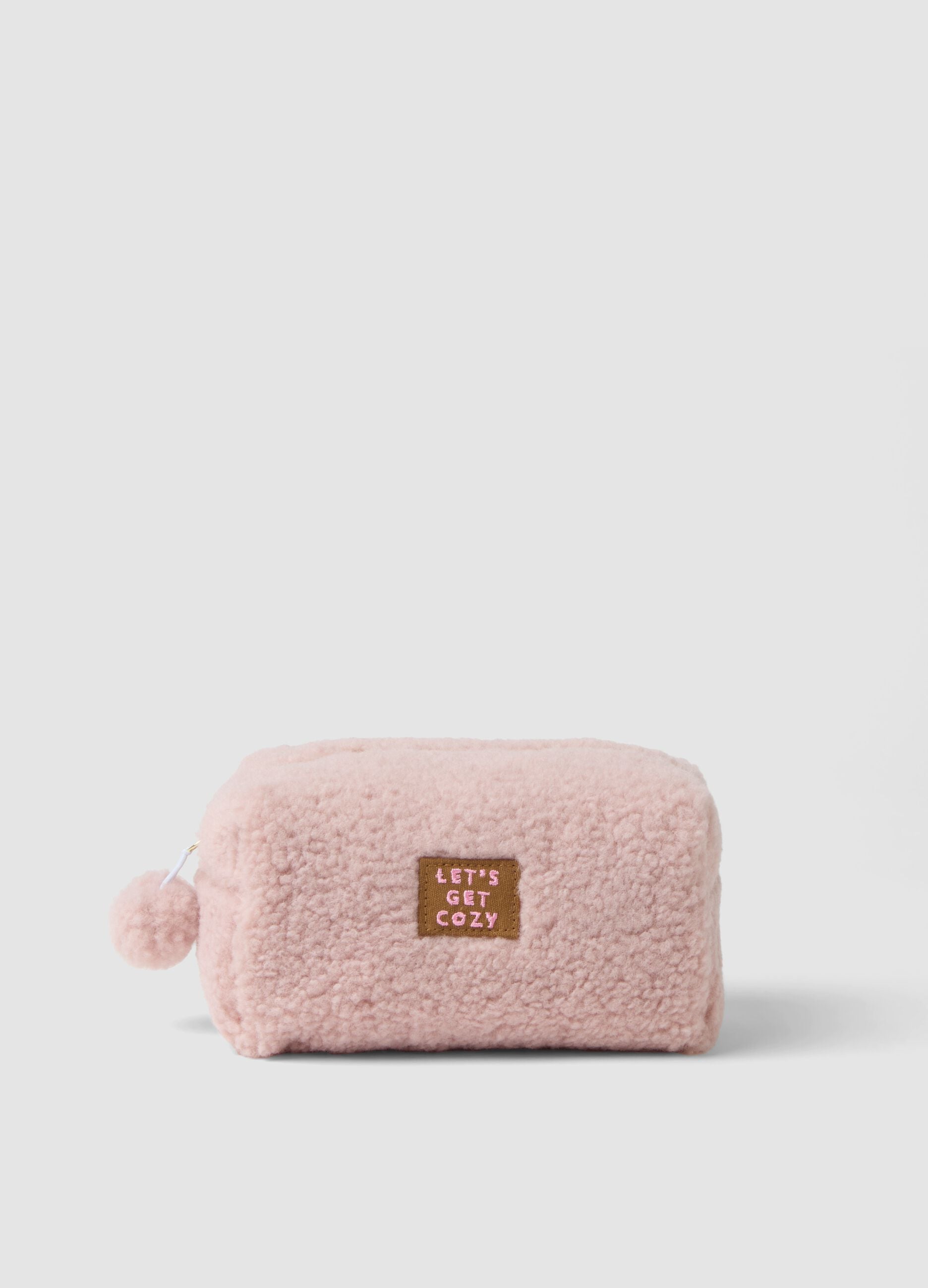 Pink makeup bag with pompom