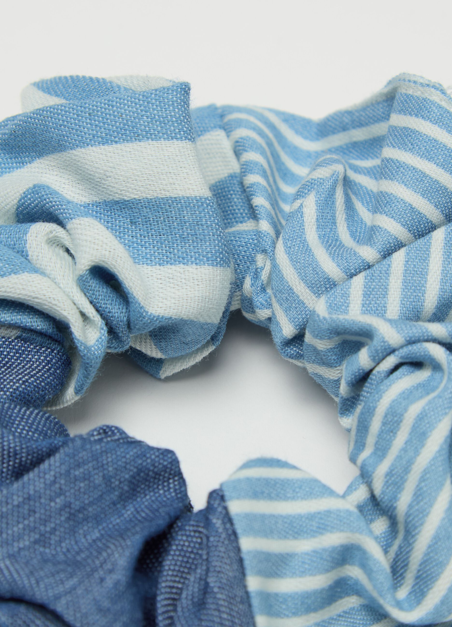 Three-pack hair elastics with white and blue stripes
