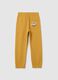 Yellow cotton jogger trousers for children_1