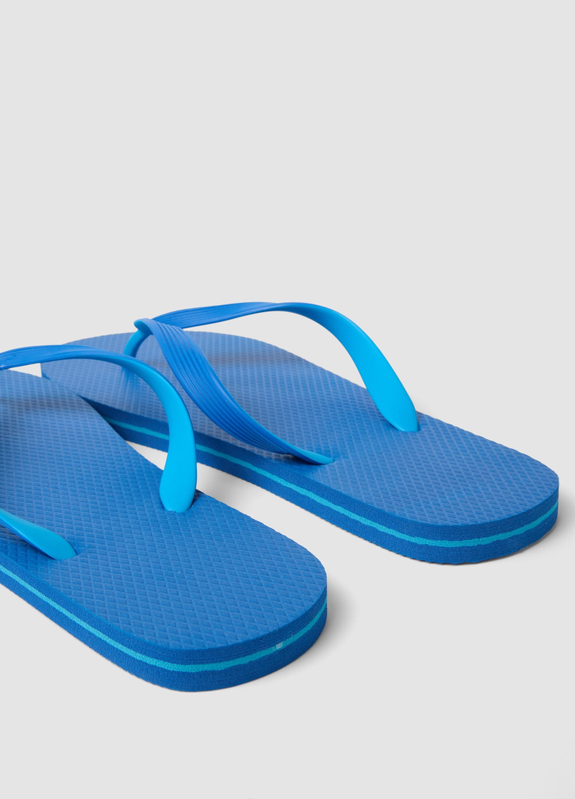 Blue flip-flops for the beach