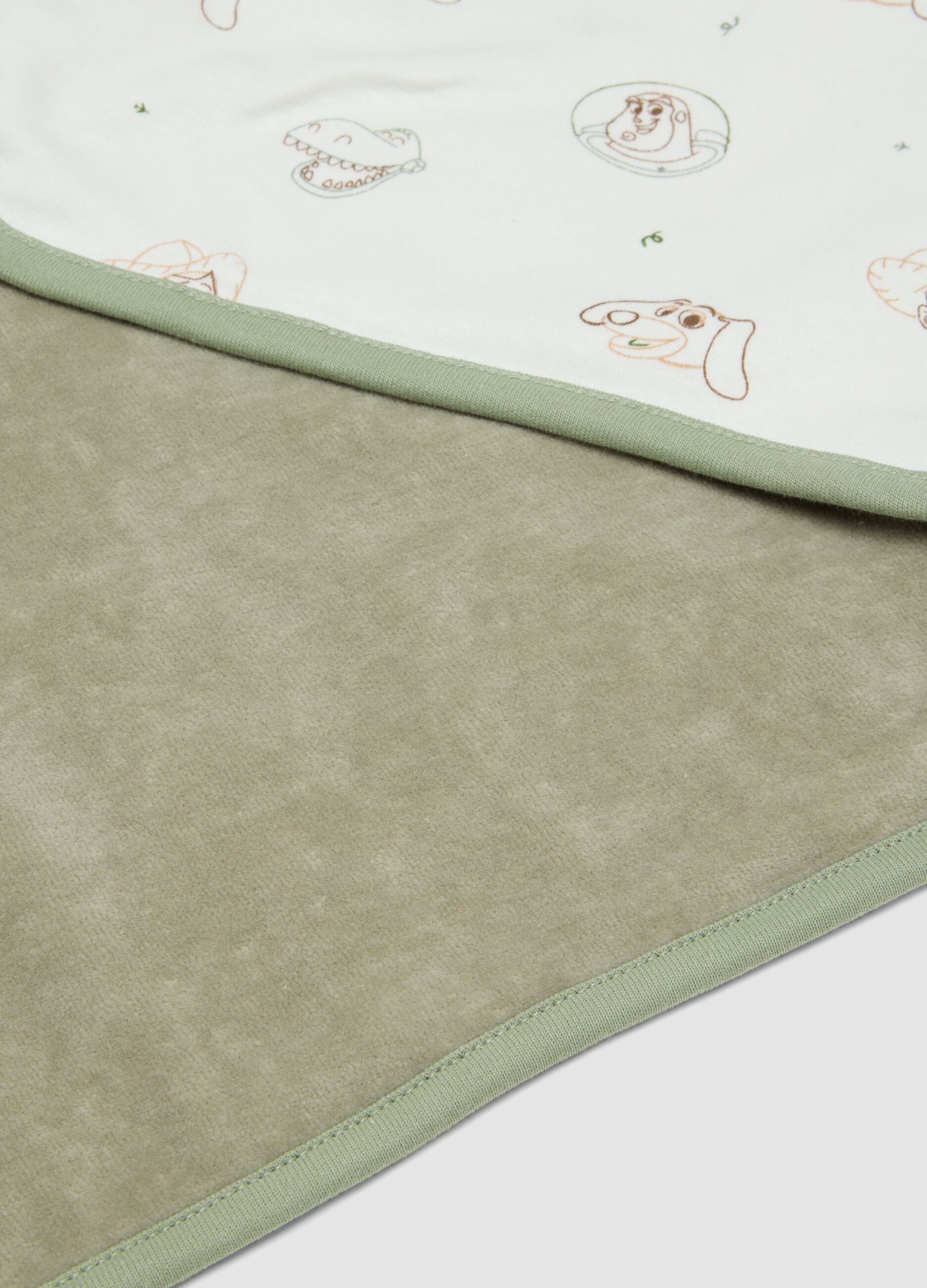 Green organic cotton-blend blanket with Toy Story print