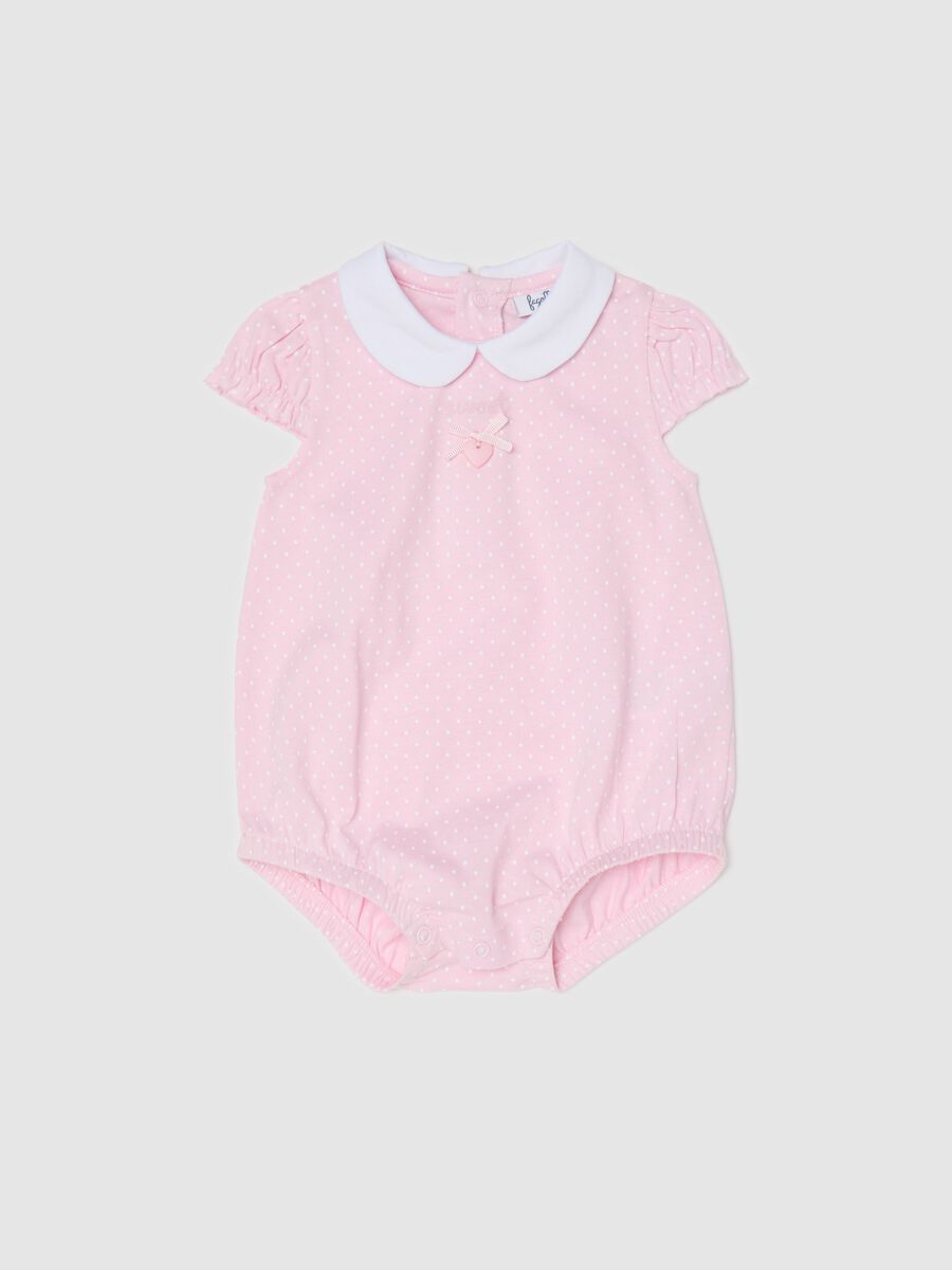 Pink romper suit in organic cotton with micro polka dot pattern_0