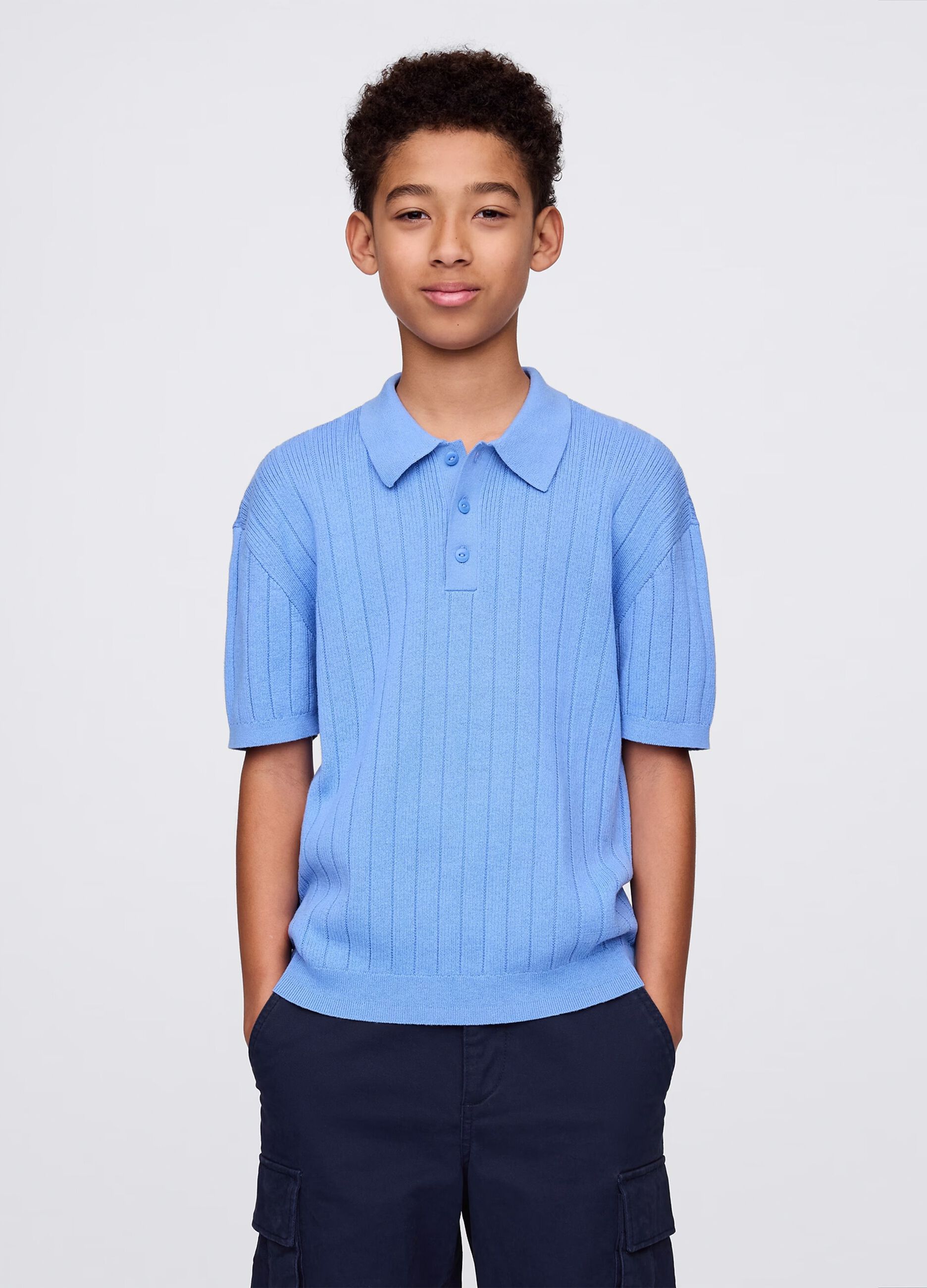 Light blue polo shirt with short sleeves in cotton