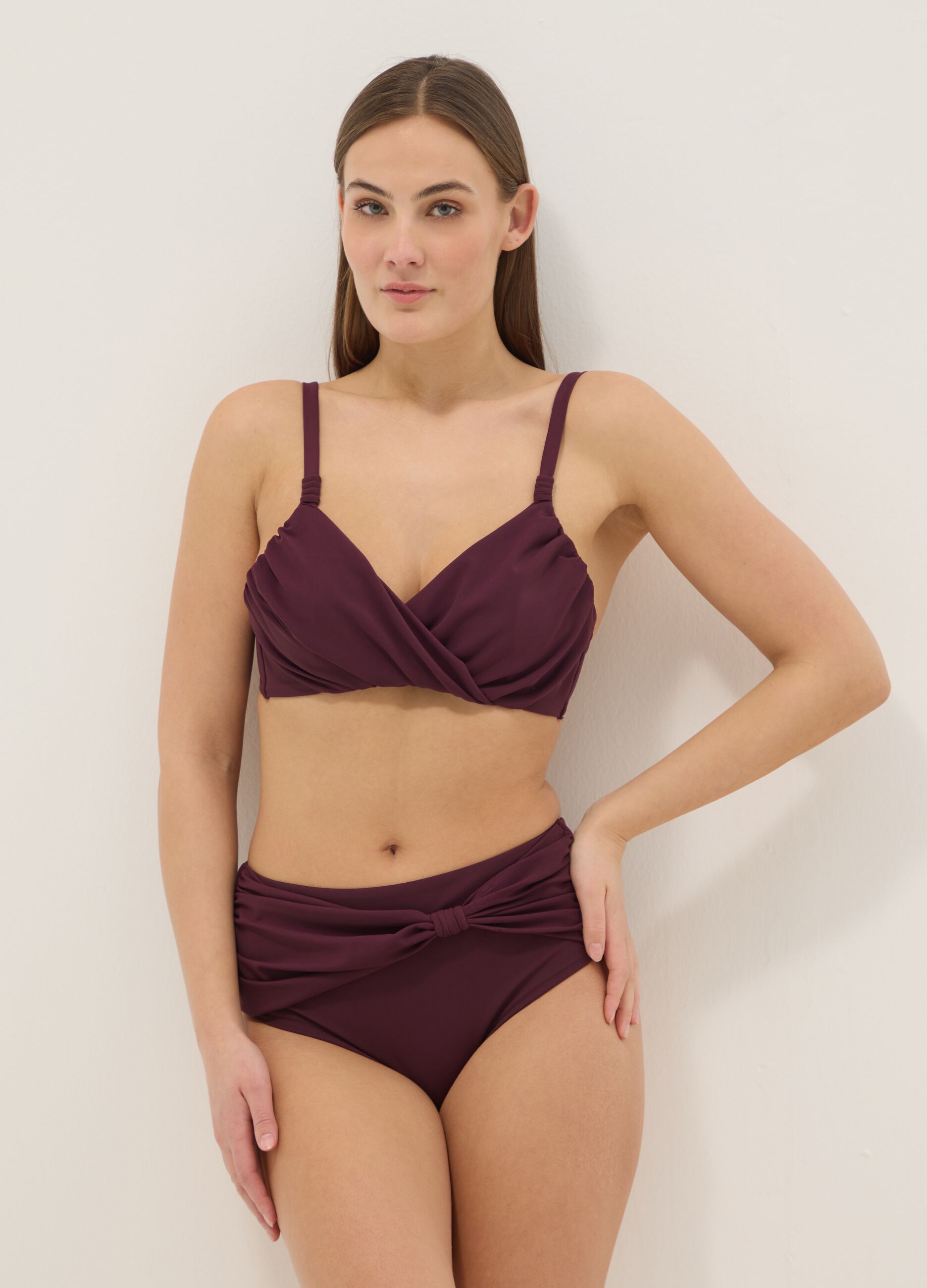 Purple bikini bottoms with knotted detail in stretchy shaping fabric