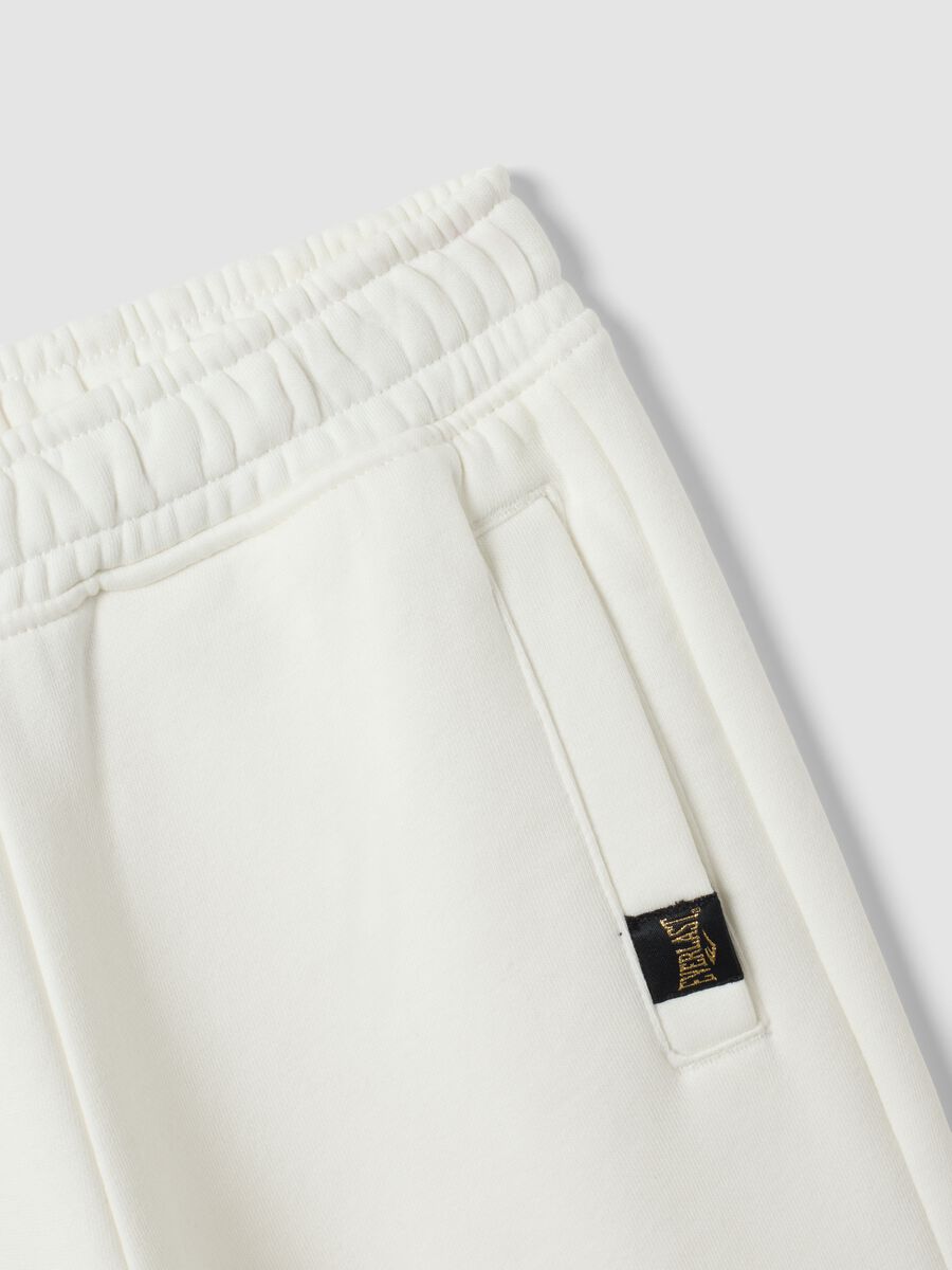 White cotton-blend regular-fit joggers for girls_2