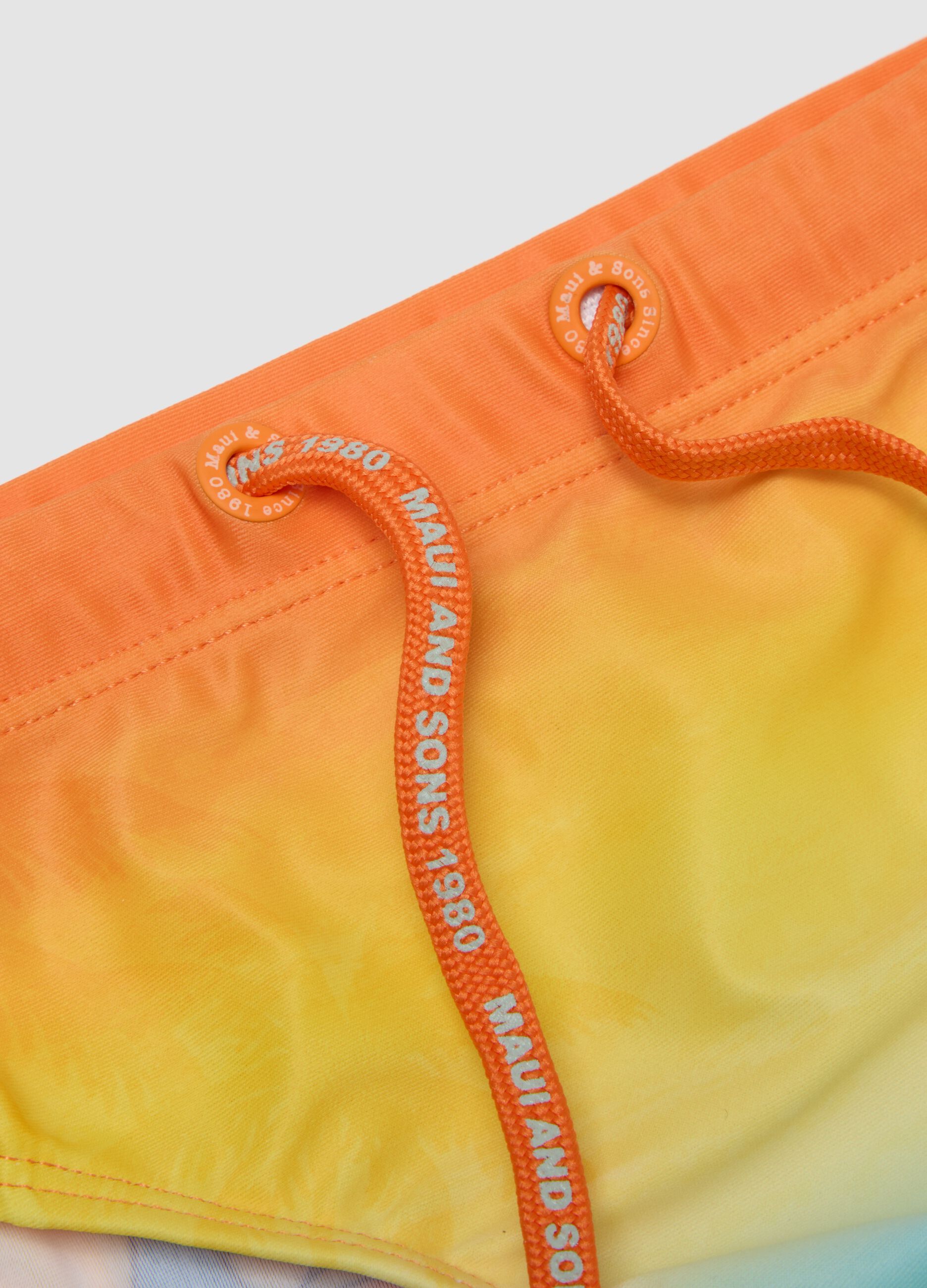 Slip mare arancione e azzurro in tessuto elasticizzato da bambino