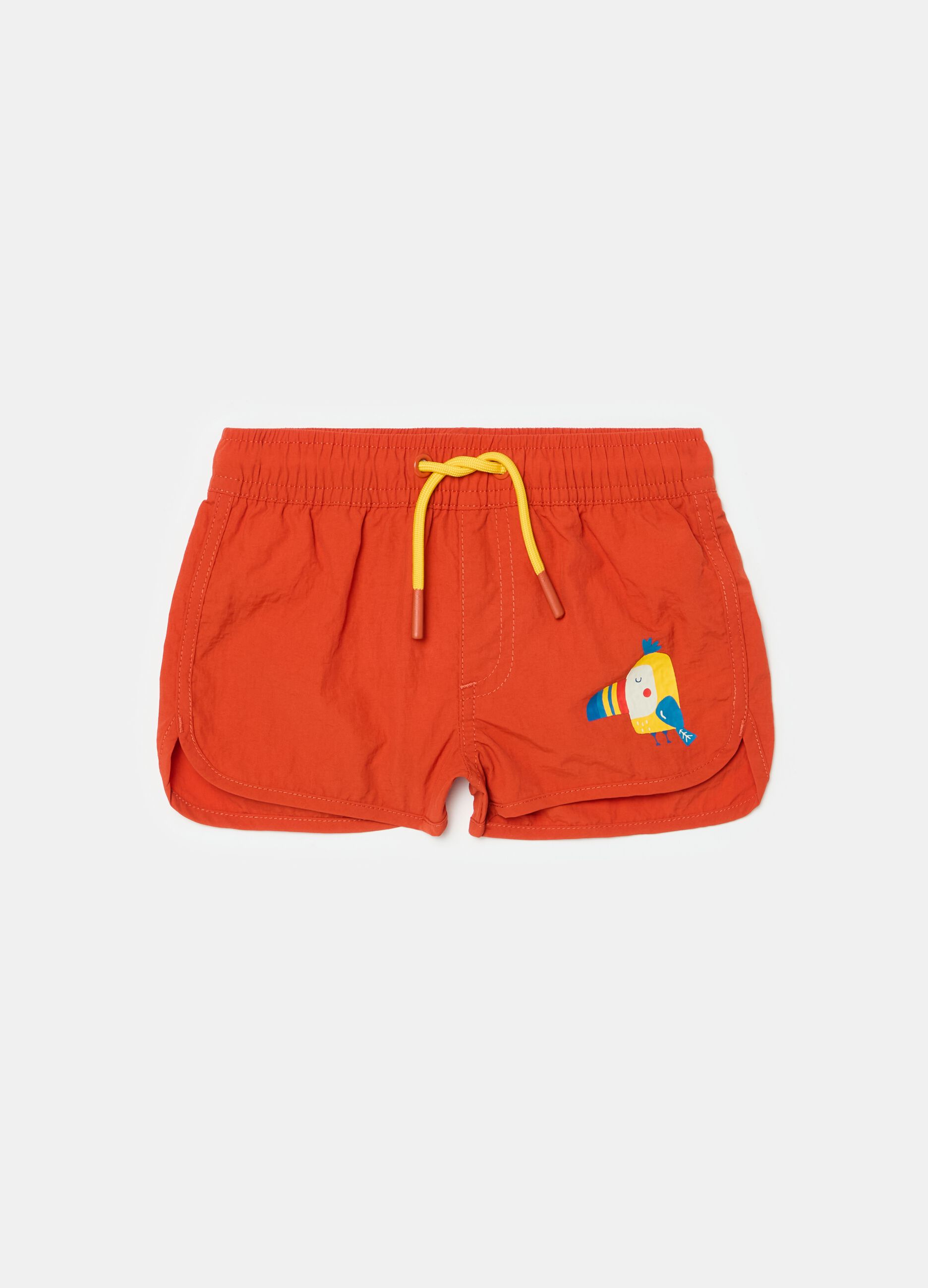 Swimming trunks with drawstring and toucan print