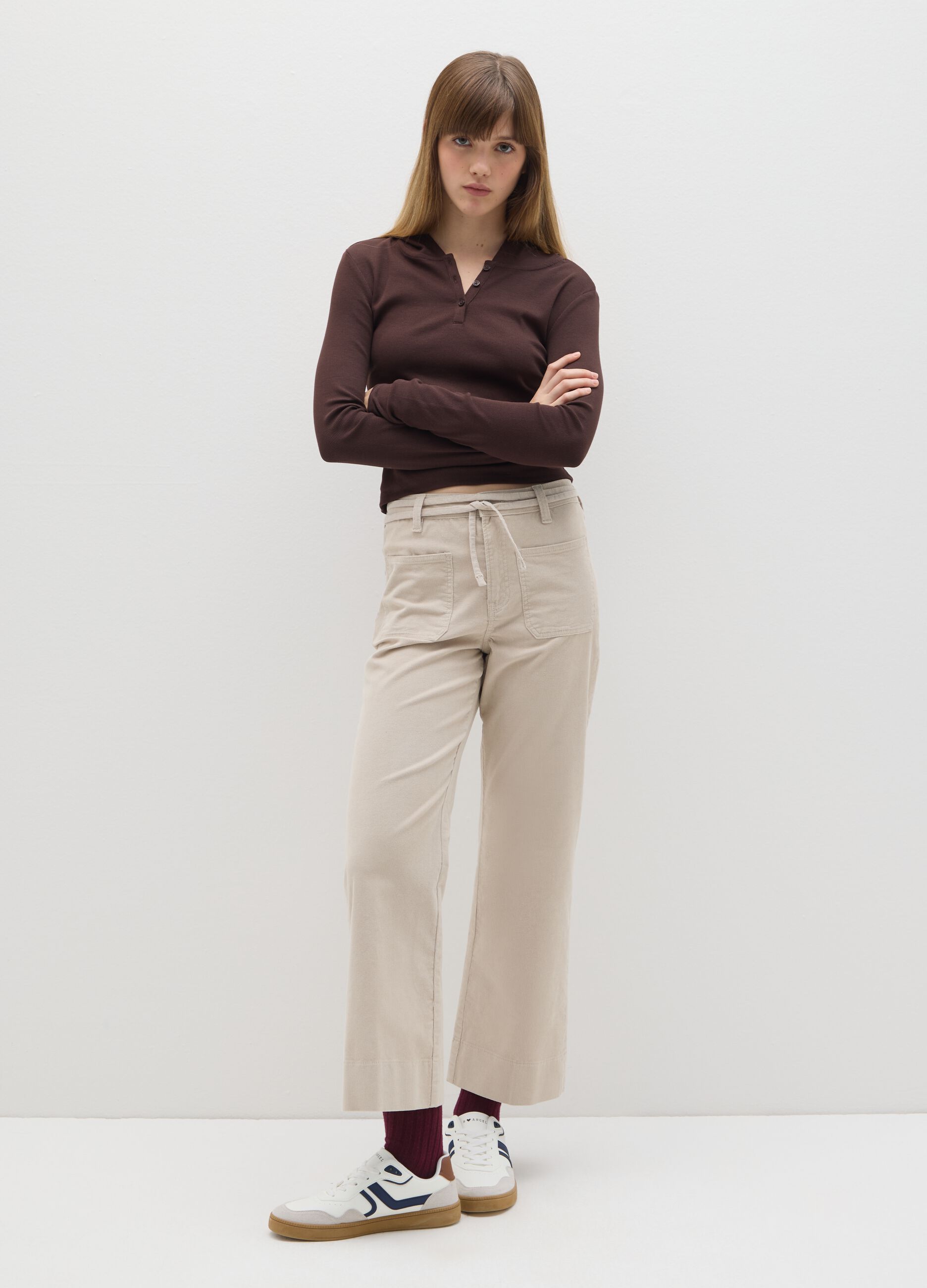 Beige flared corduroy trousers