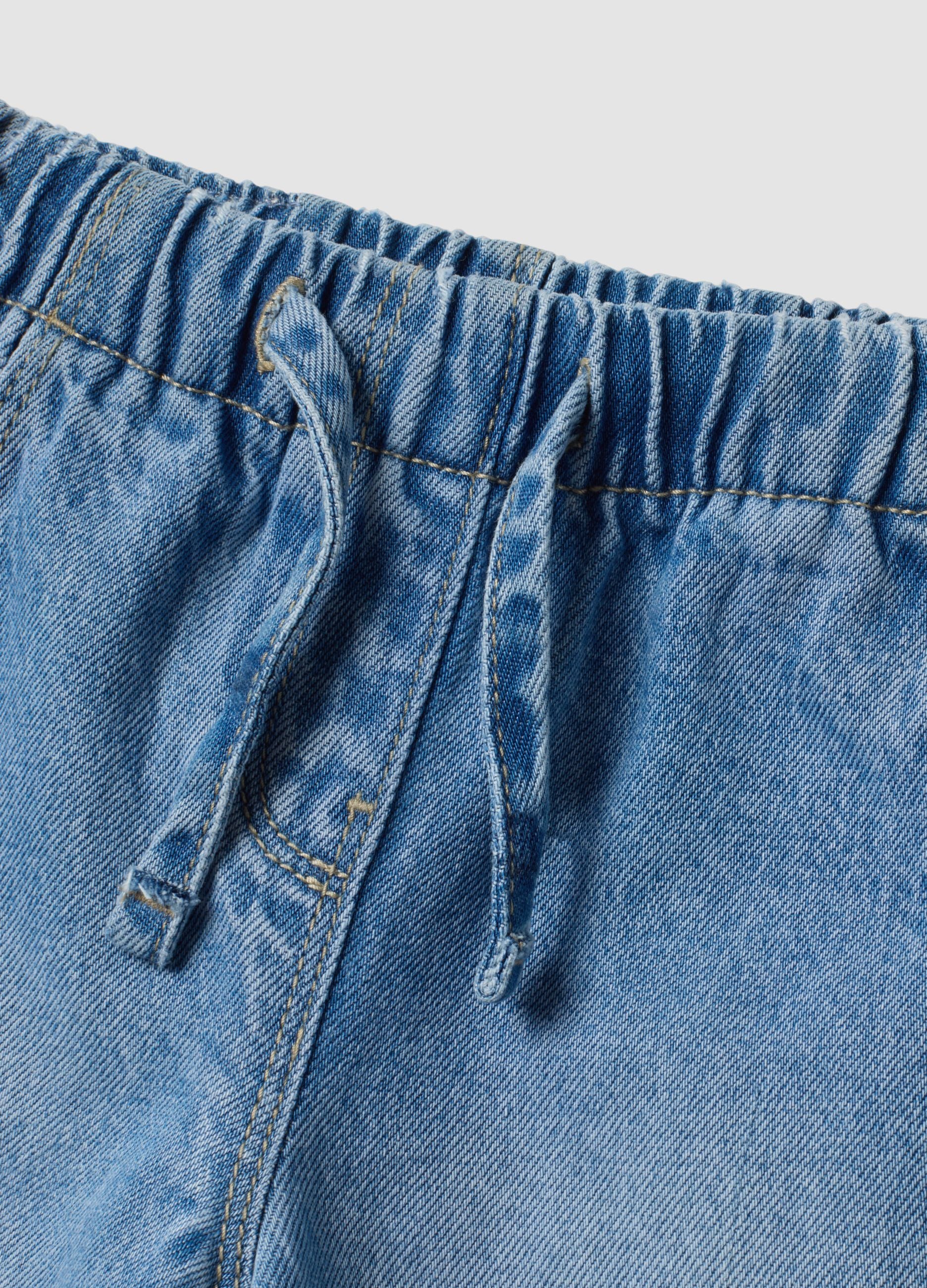 Light blue cotton and lyocell blend jeans with Lilo & Stitch print for baby girl