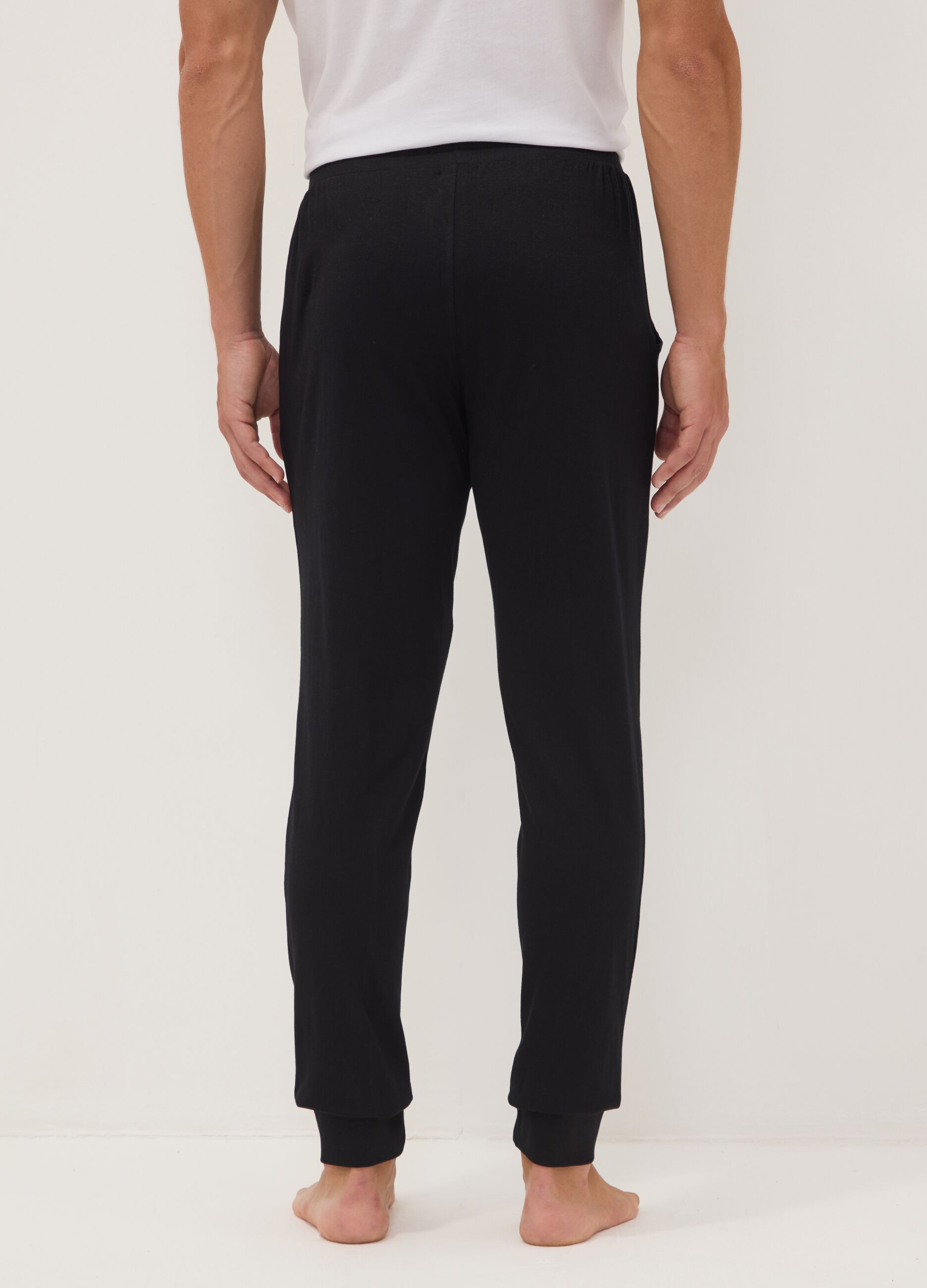 Blue organic cotton pyjama trousers with elasticated waistband