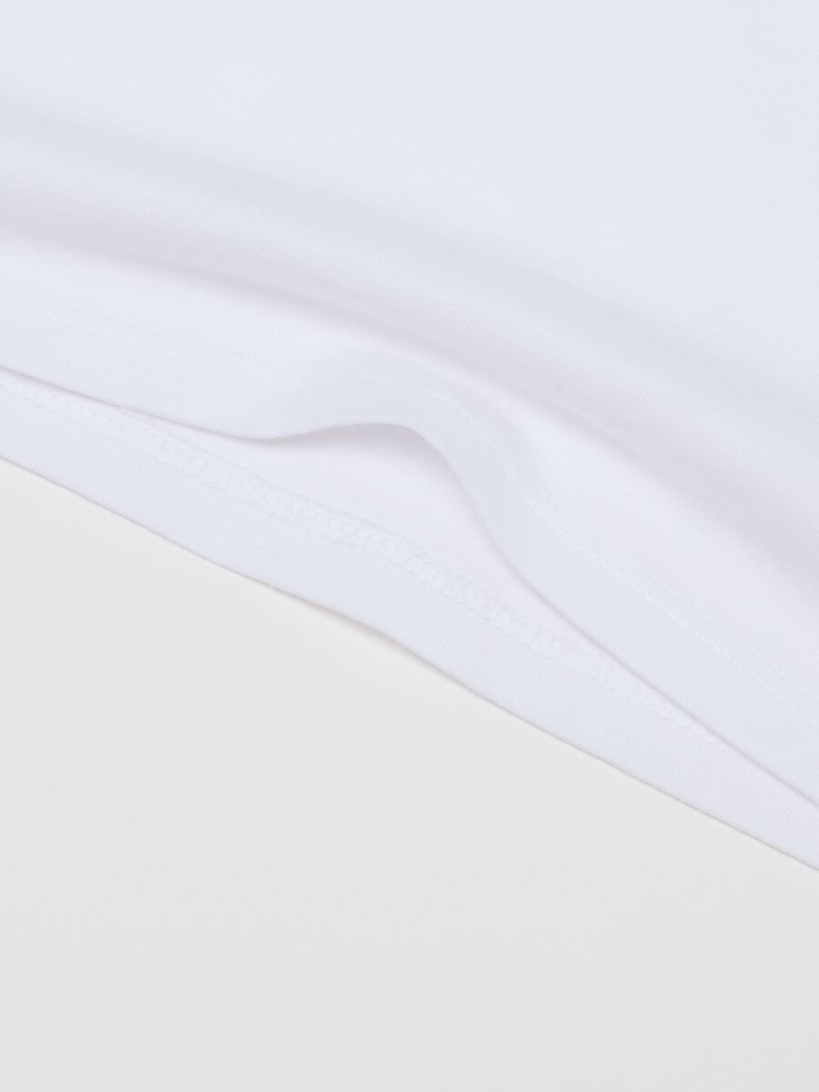 Twin pack of white girls' vests in pure cotton regular fit_2