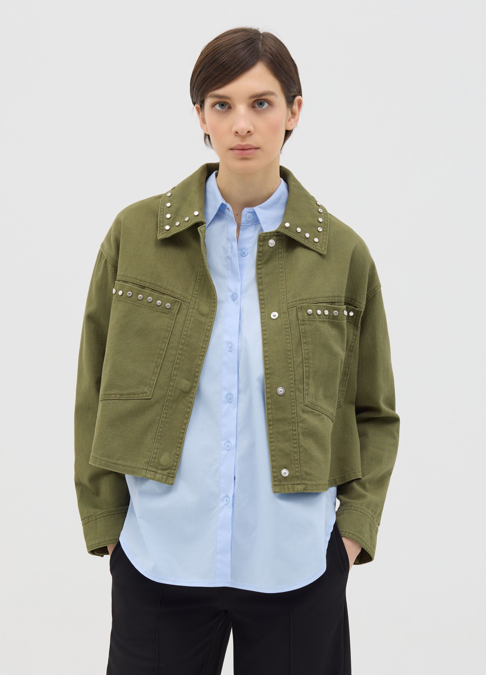 Green jacket in cotton with studs