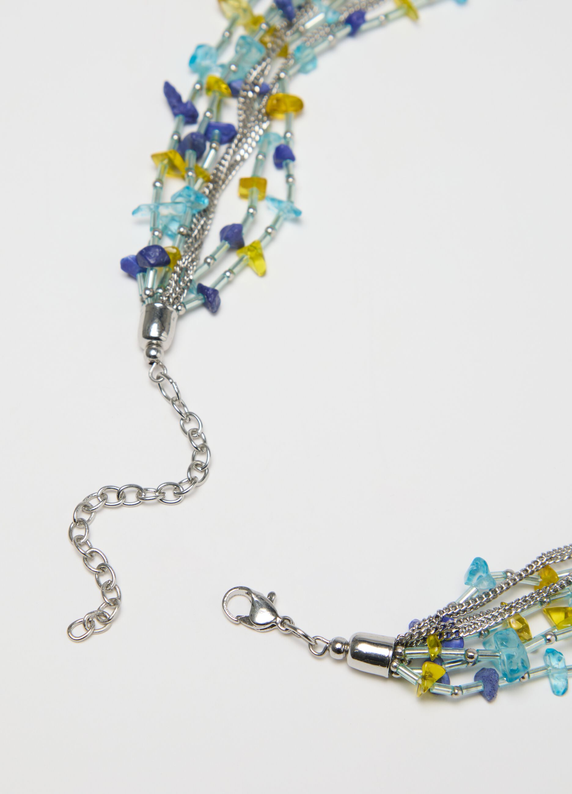 Long multi-strand necklace with coloured beads