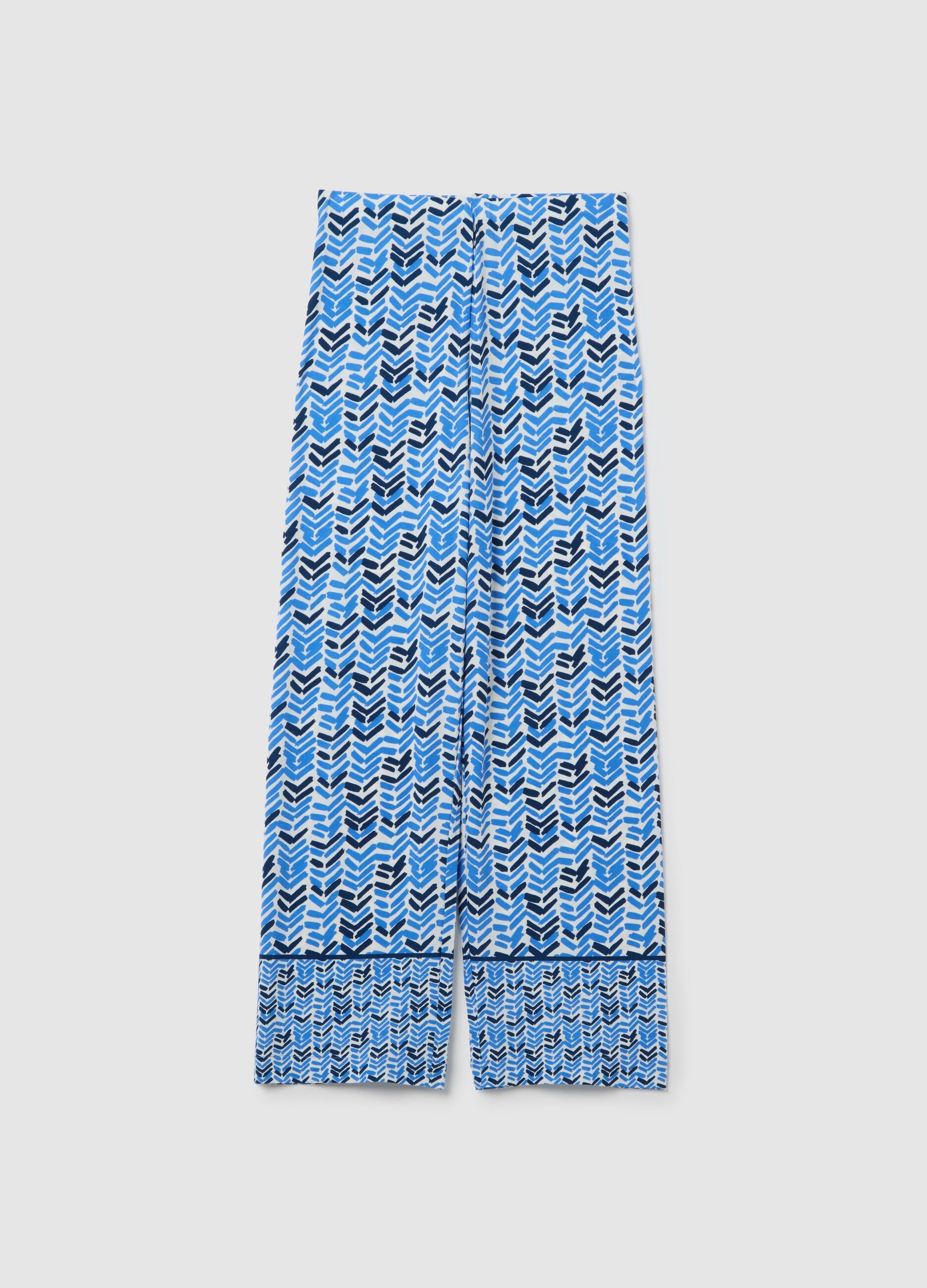 Blue jersey trousers with geometric pattern