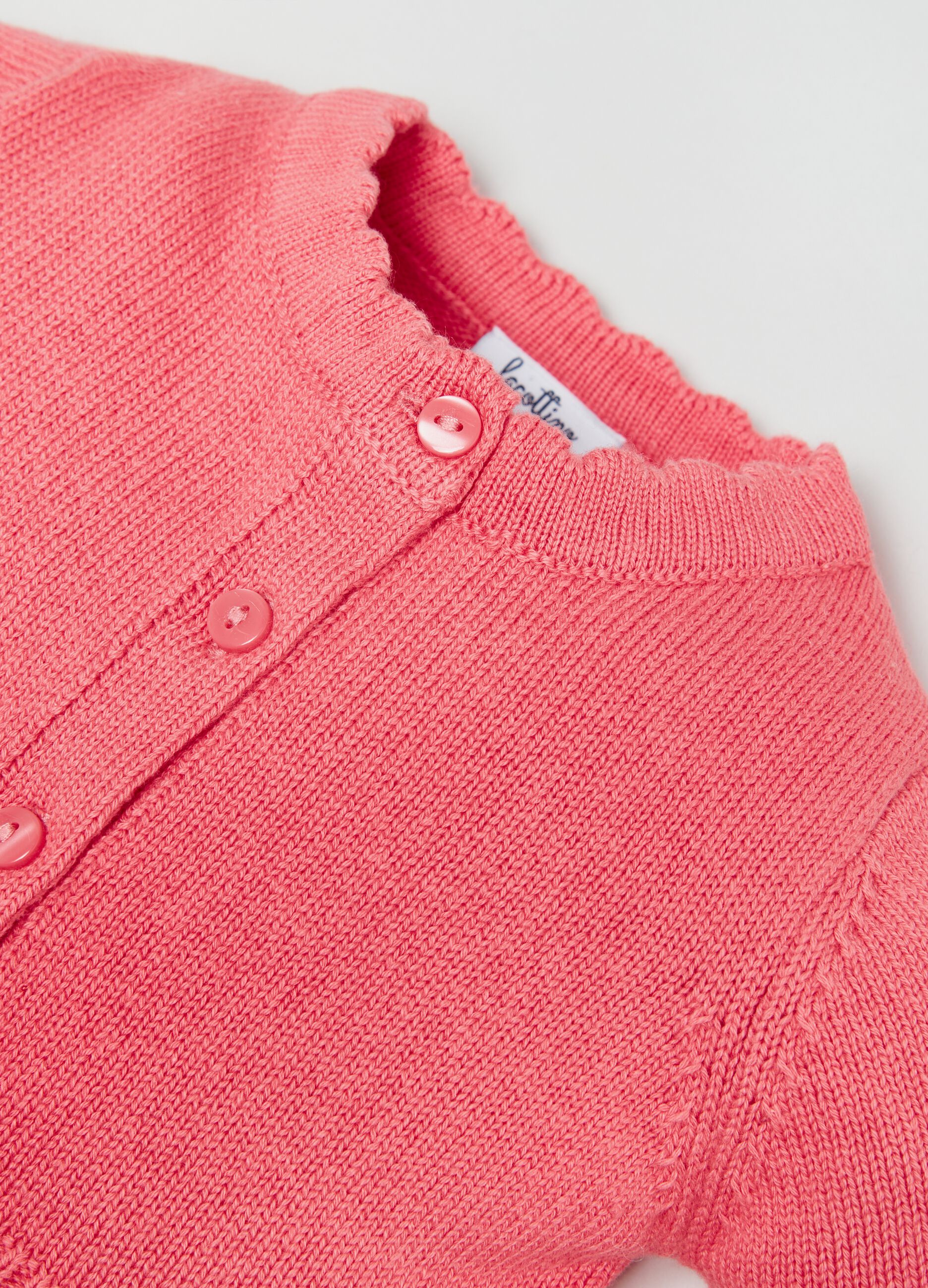 Cardigan in maglia con profili ondulati