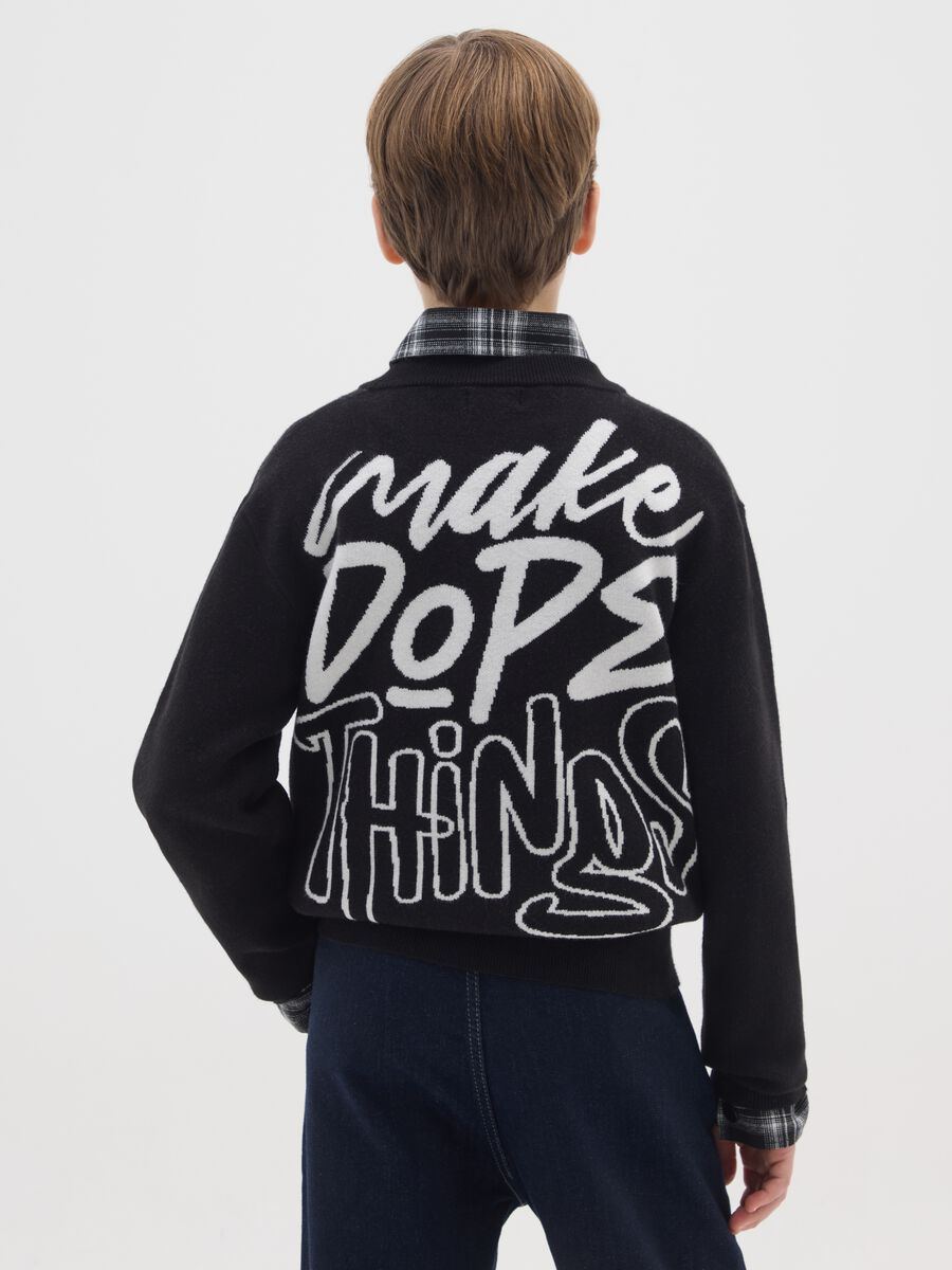 Maglione da ragazzo nero vestibilità over_1