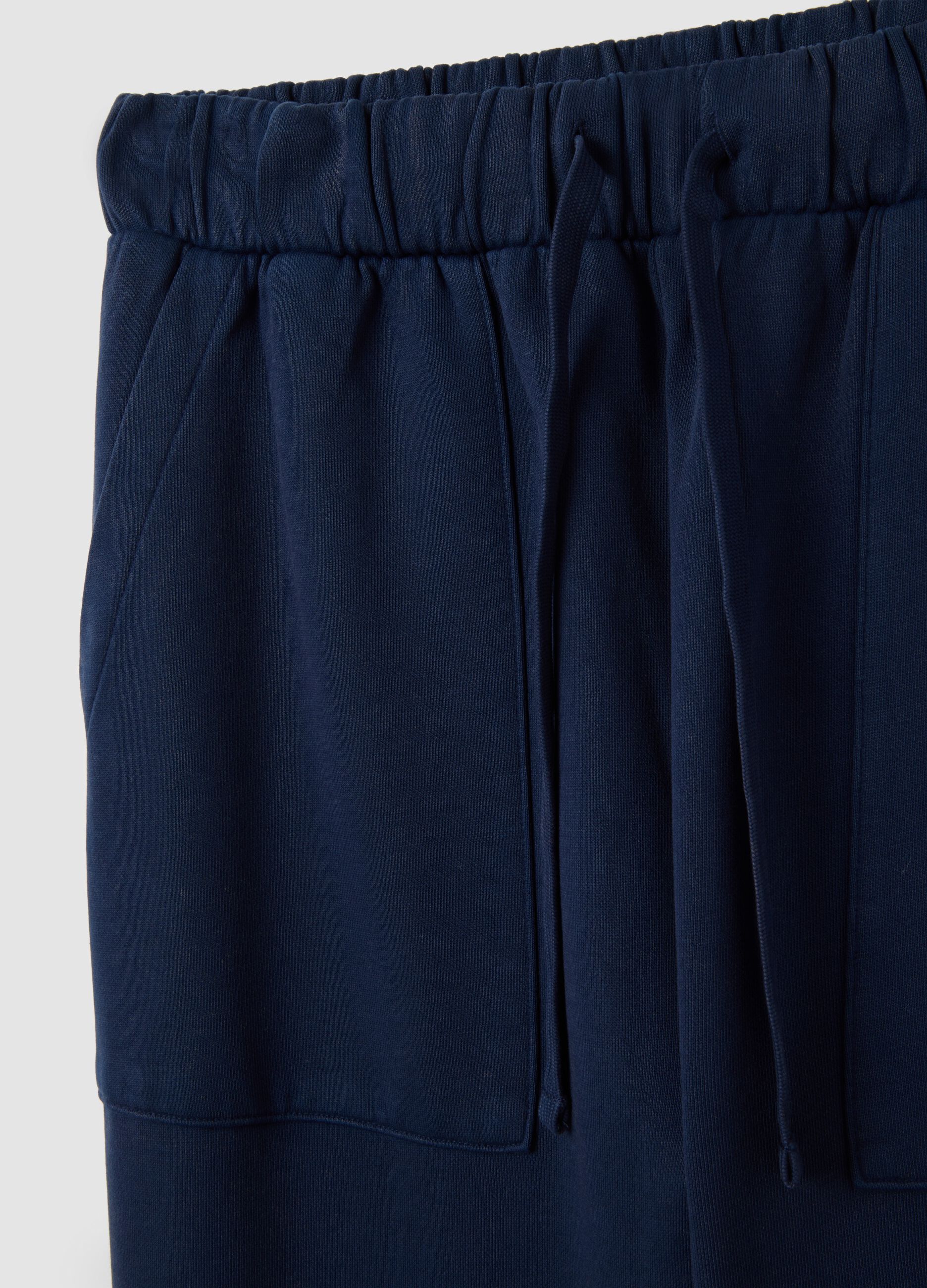Blue cotton trousers with elastic waistband