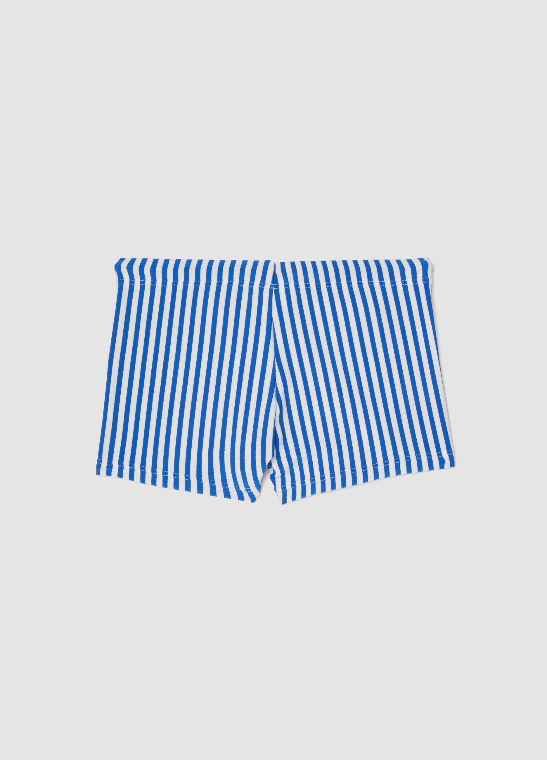 Blue and white stretch swim trunks