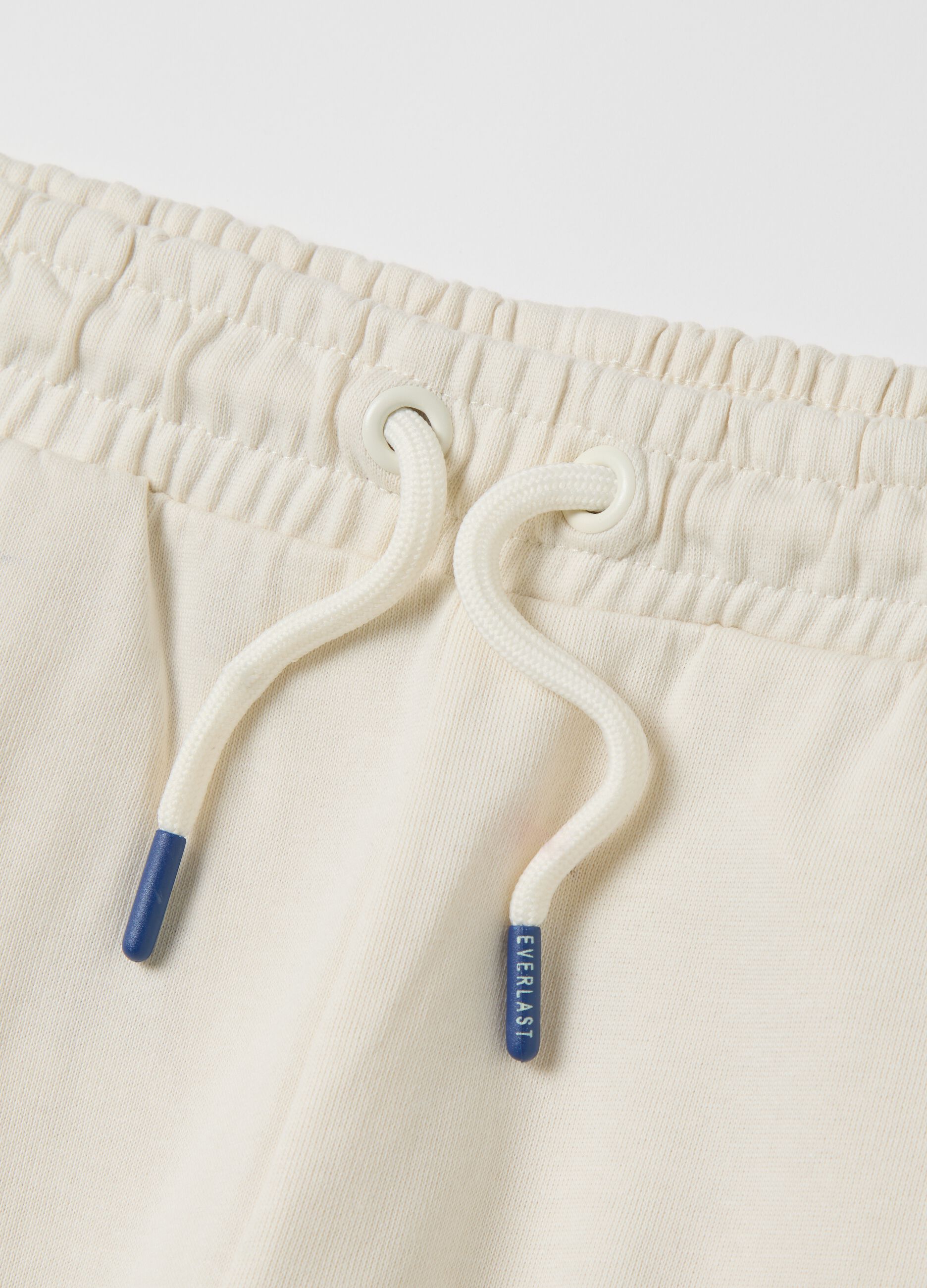 Bermuda jogger bianchi con coulisse e stampa logo
