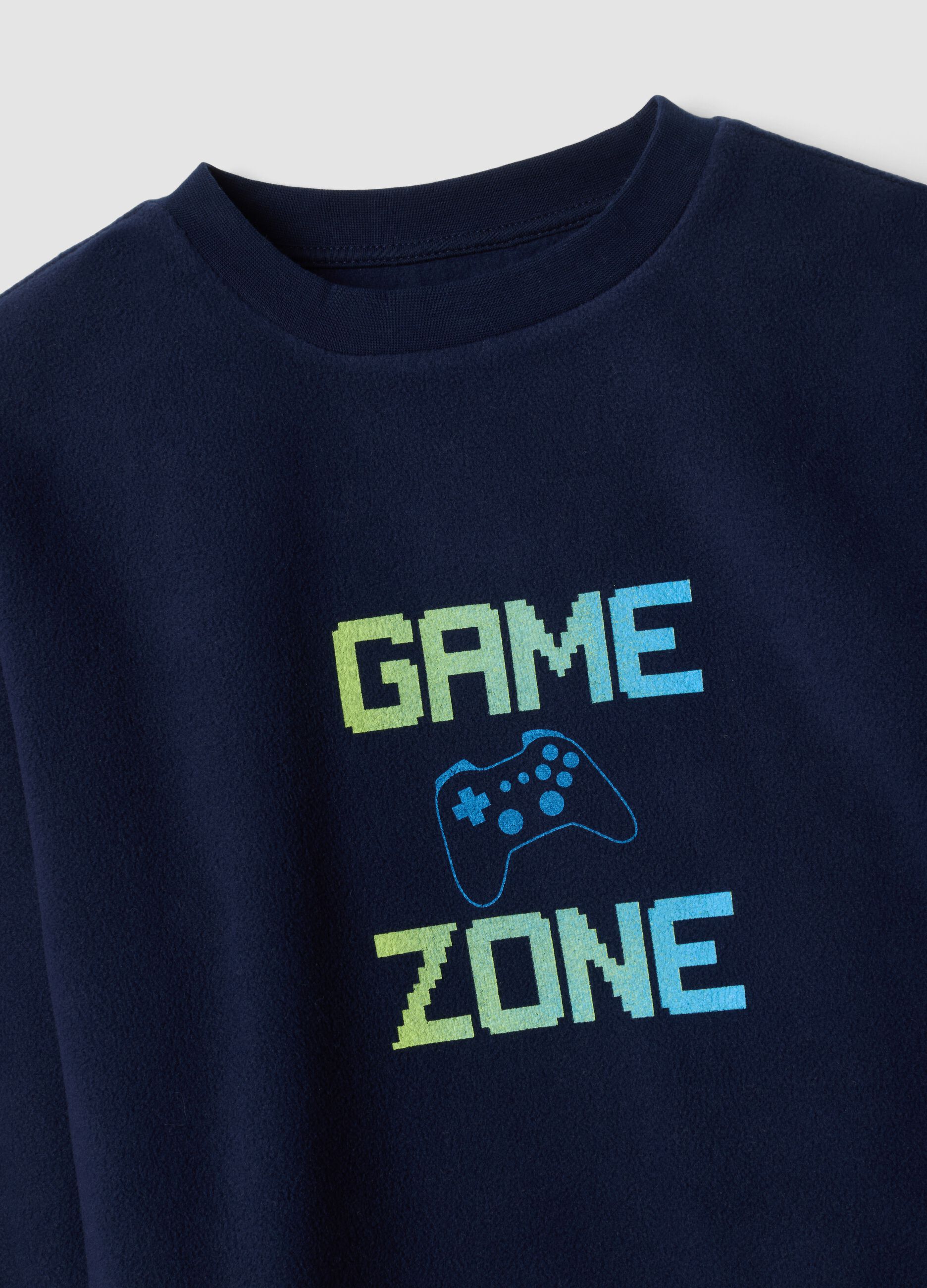 Blue crew-neck pyjamas with video game print trousers