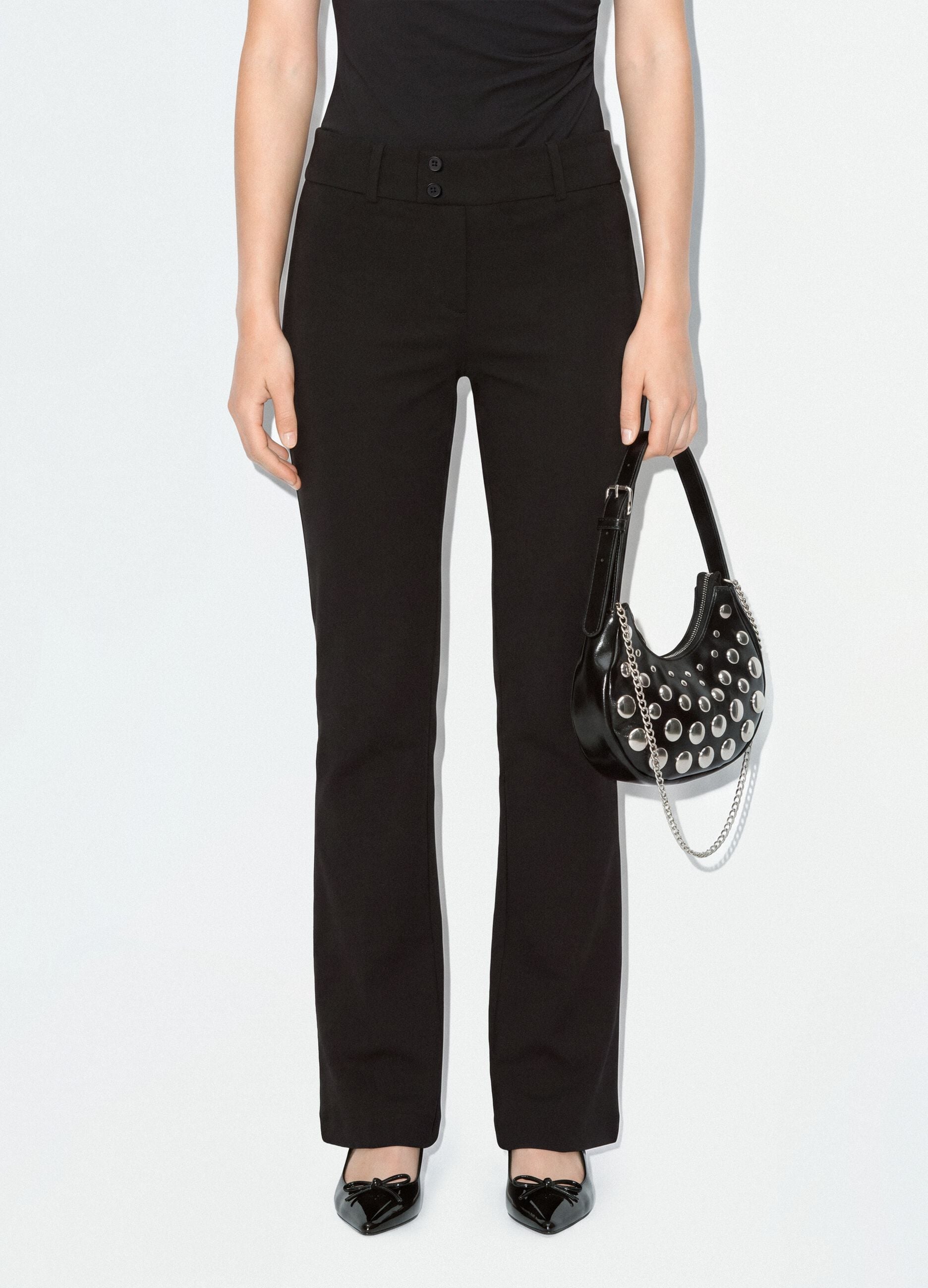 Black flared trousers in stretch viscose