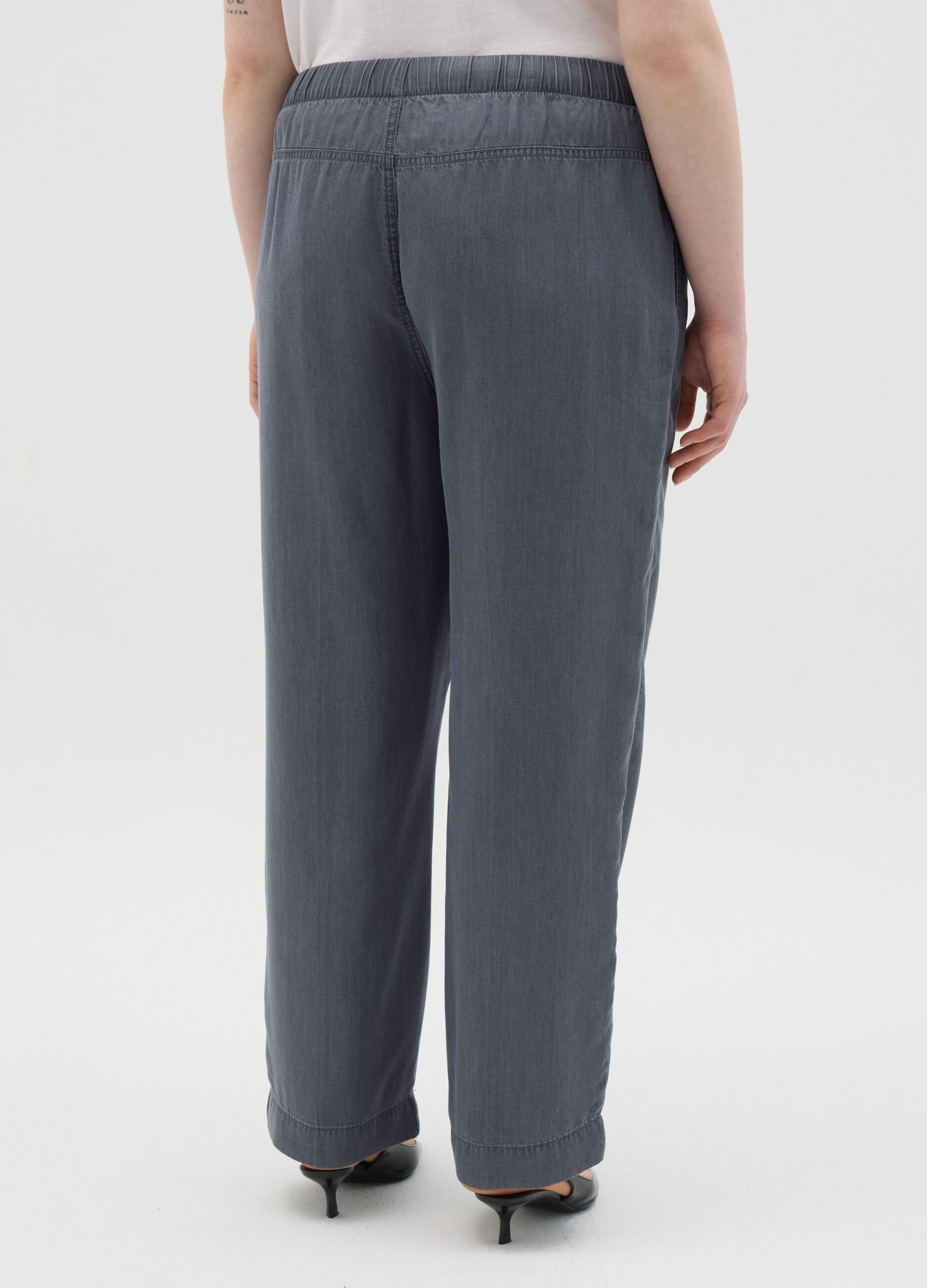 Curvy grey jogger trousers with denim effect