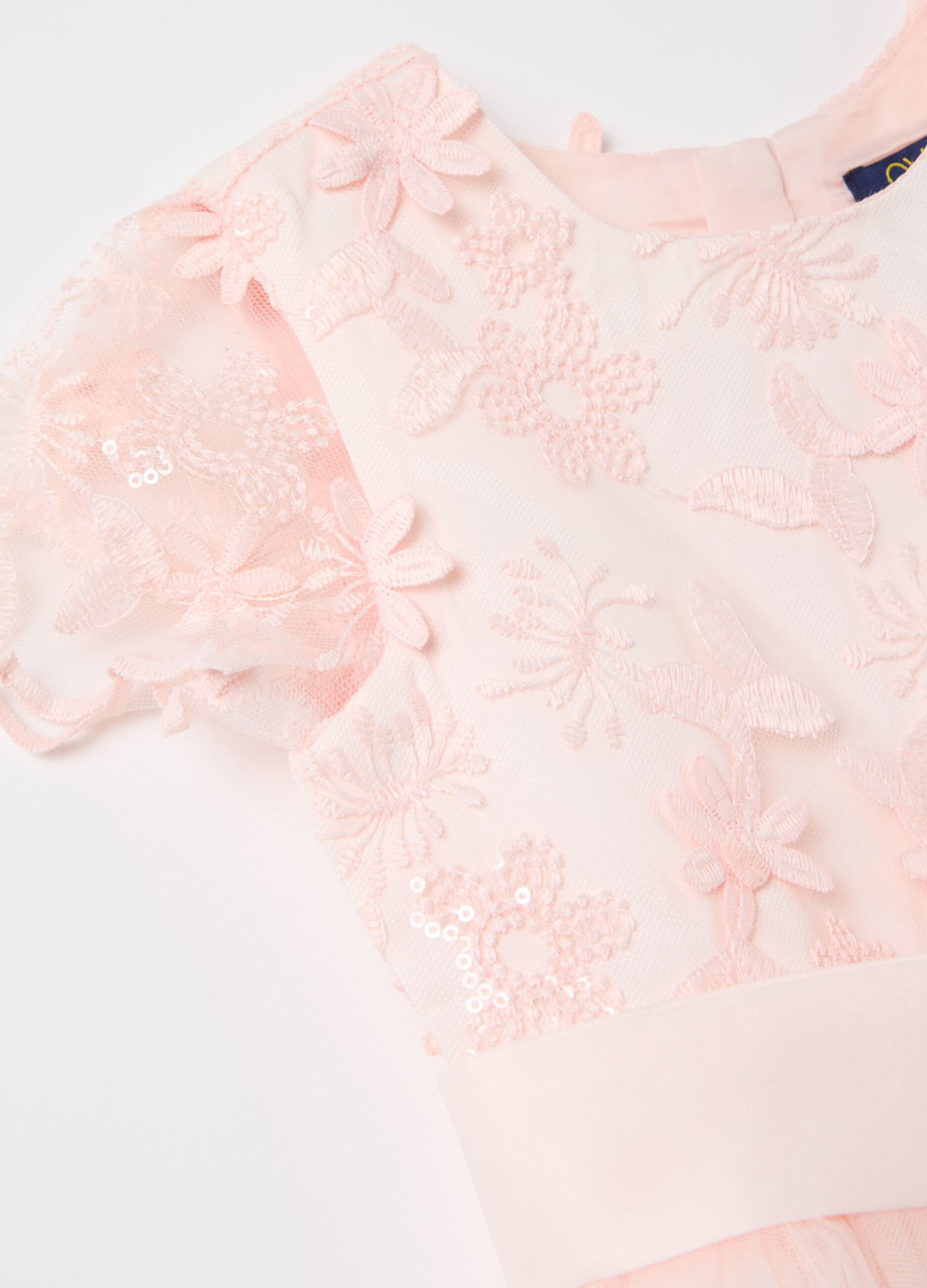 Abito in tulle con applicazioni floreali