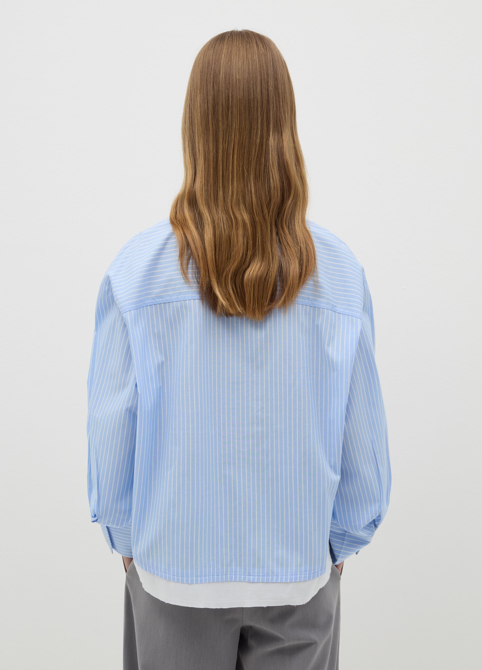 Pinstriped shirt with layered-effect details