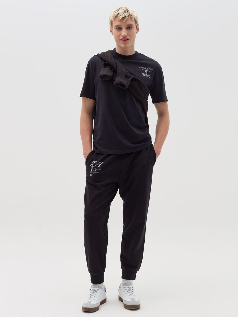 Fleece joggers with print_0