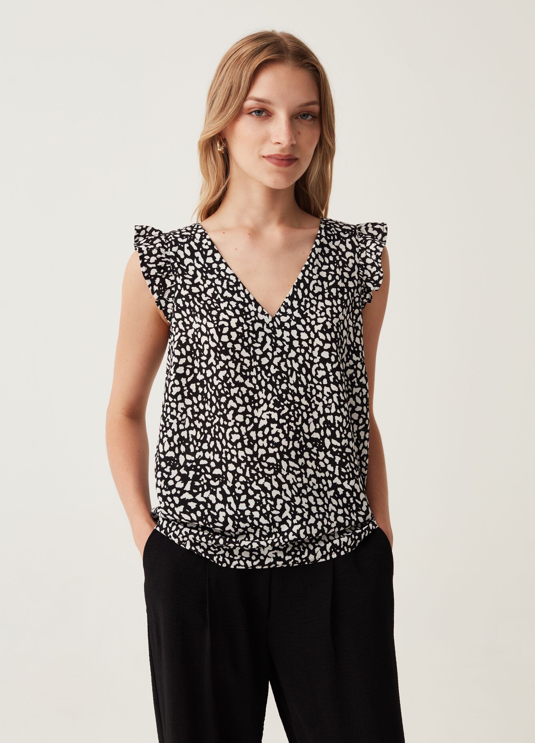 Blusa con volant fantasia_0
