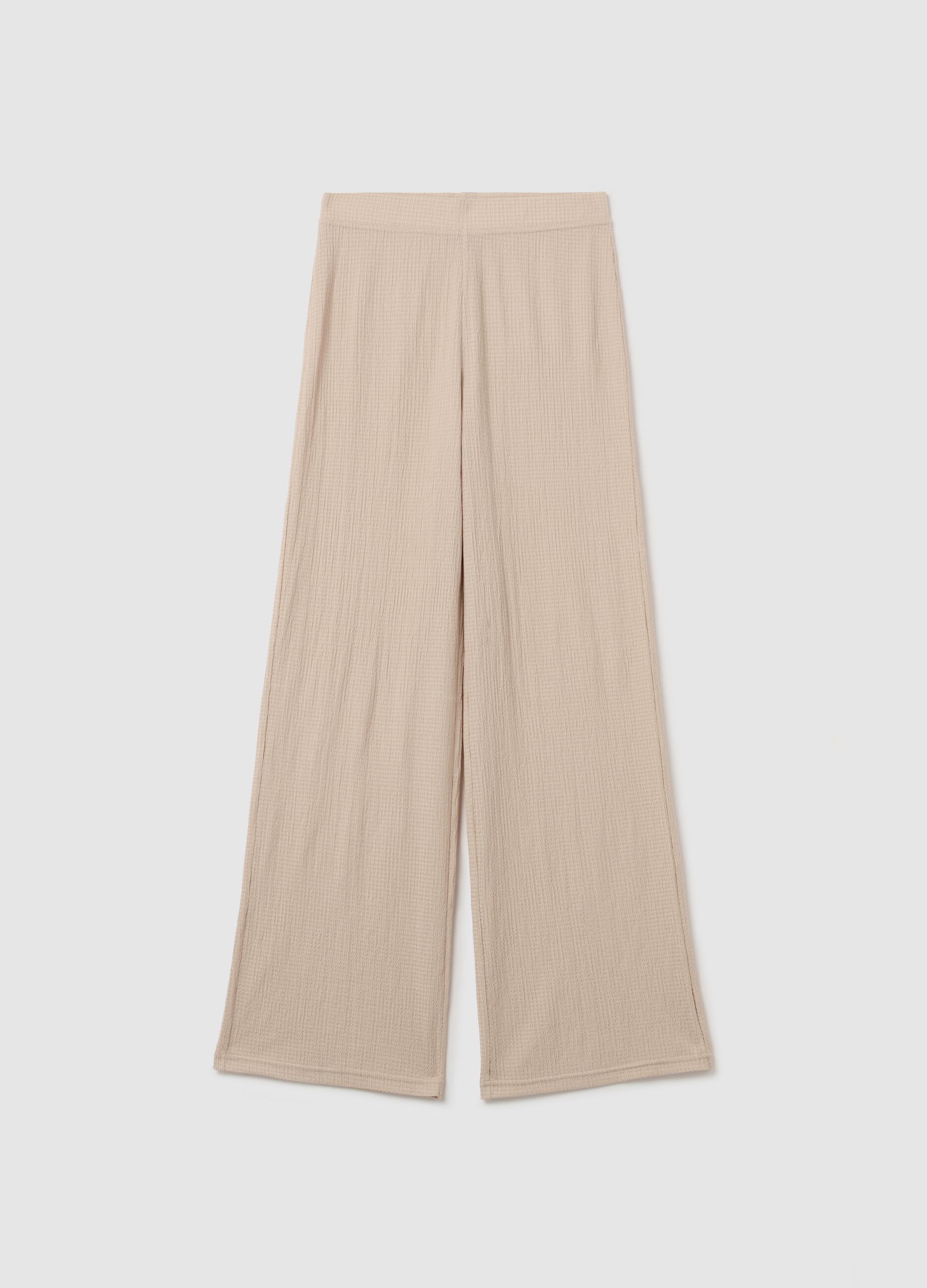 Wide-leg beige trousers with waffle weave