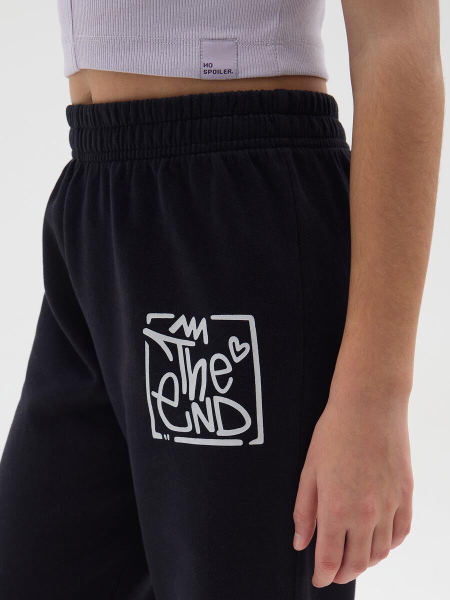 Girls' black jogger trousers in pure cotton with print_2