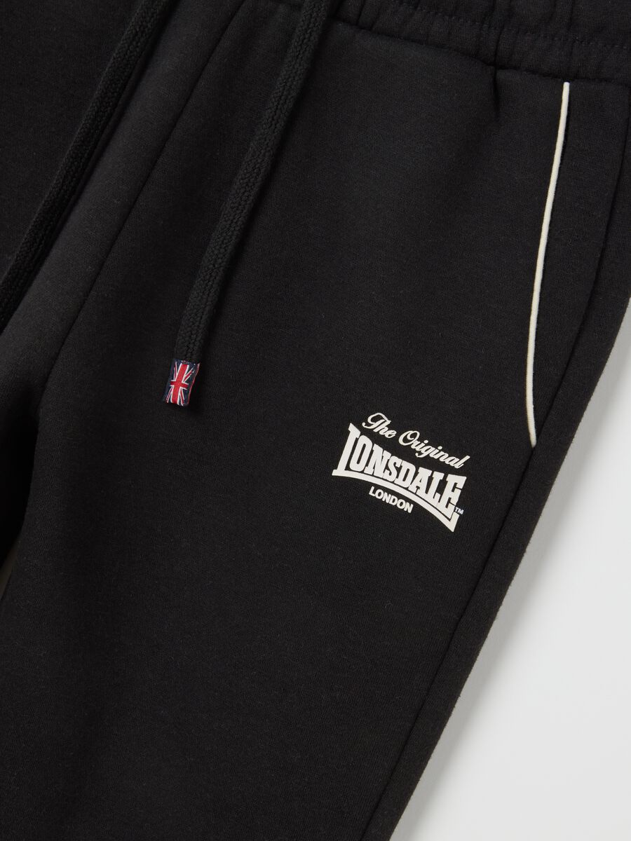 Black regular fit cotton blend trousers_5
