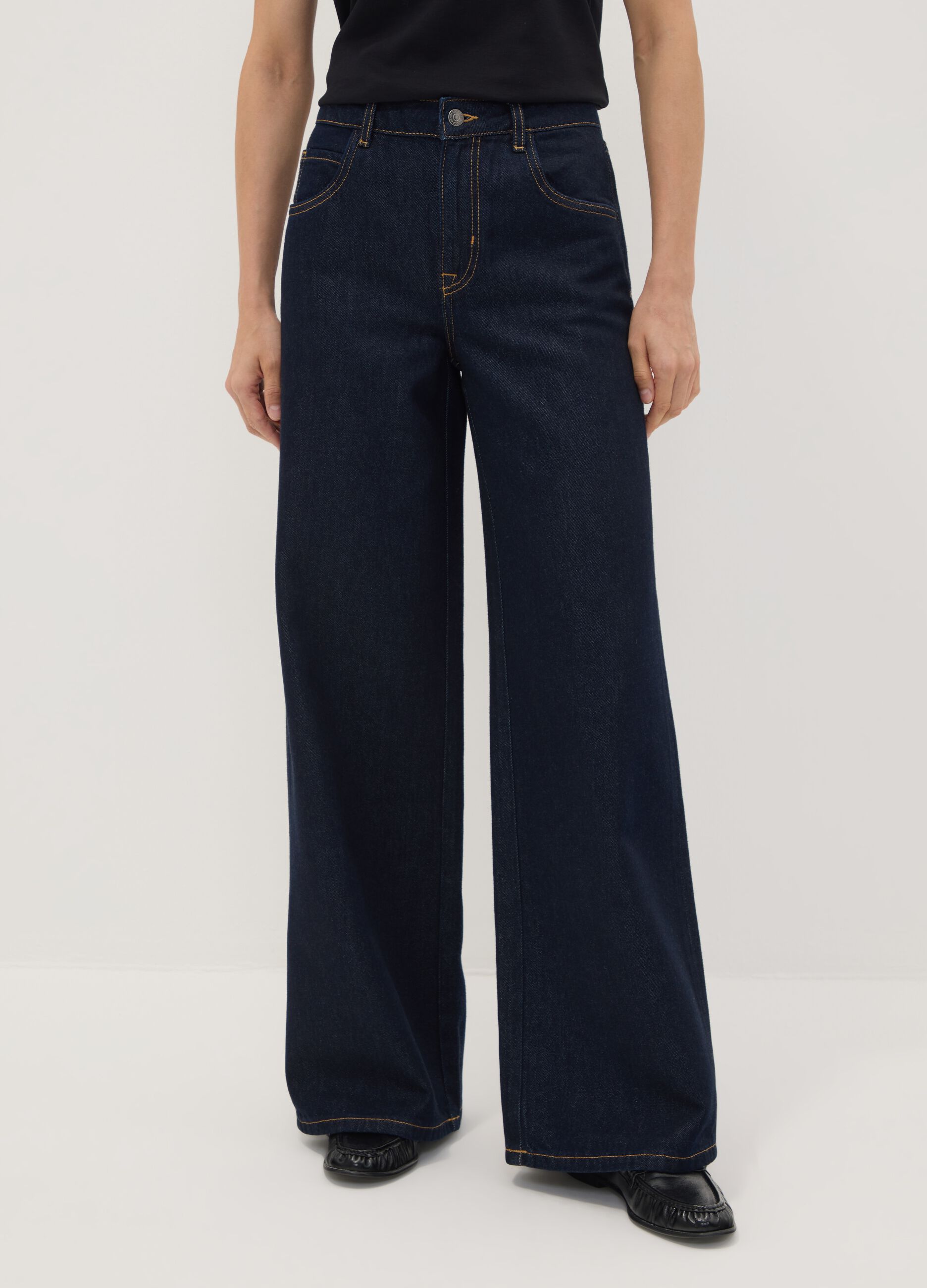 Blue denim bootcut jeans in cotton and lyocell blend