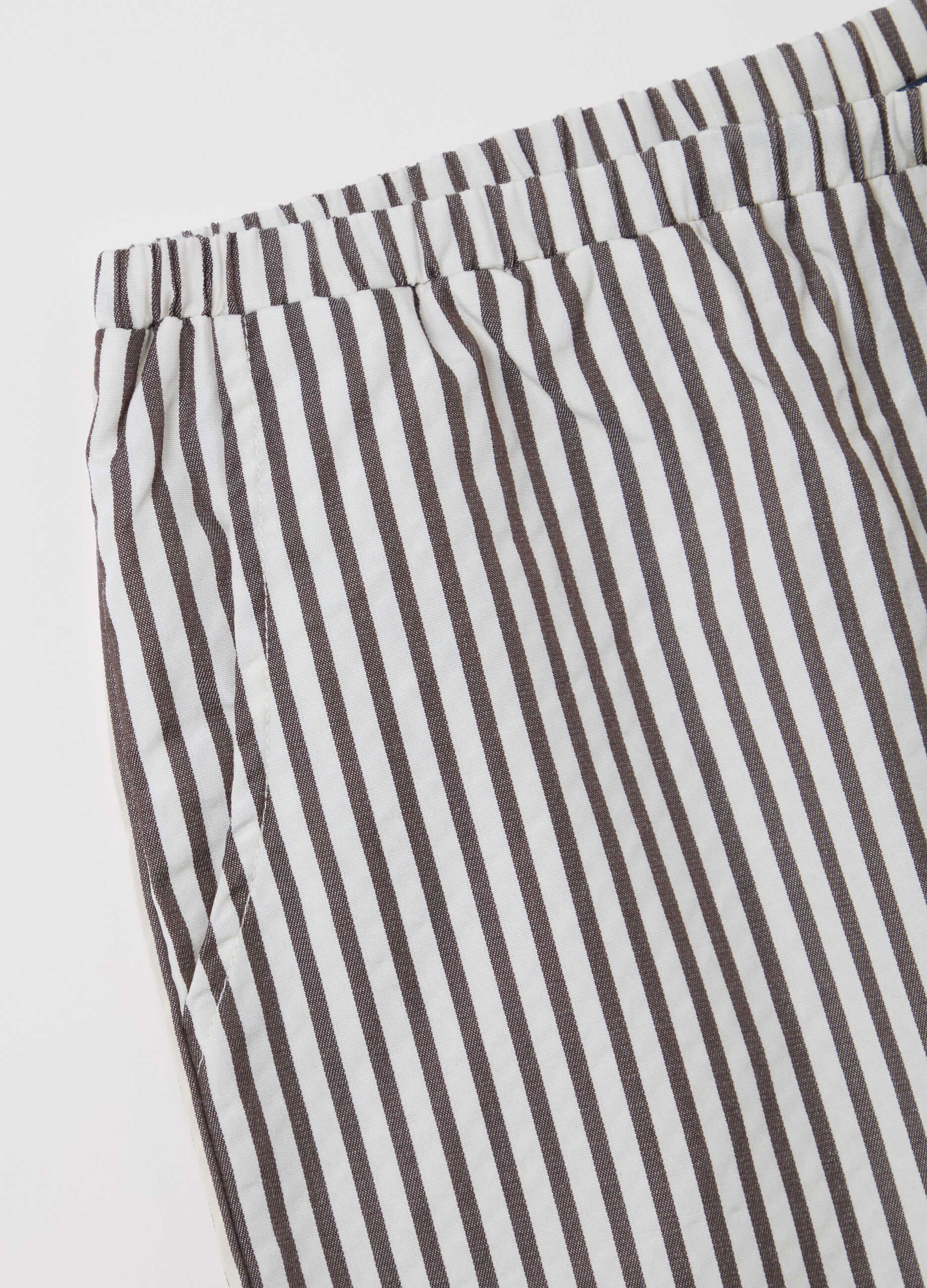 White and brown wide-leg trousers with stripes