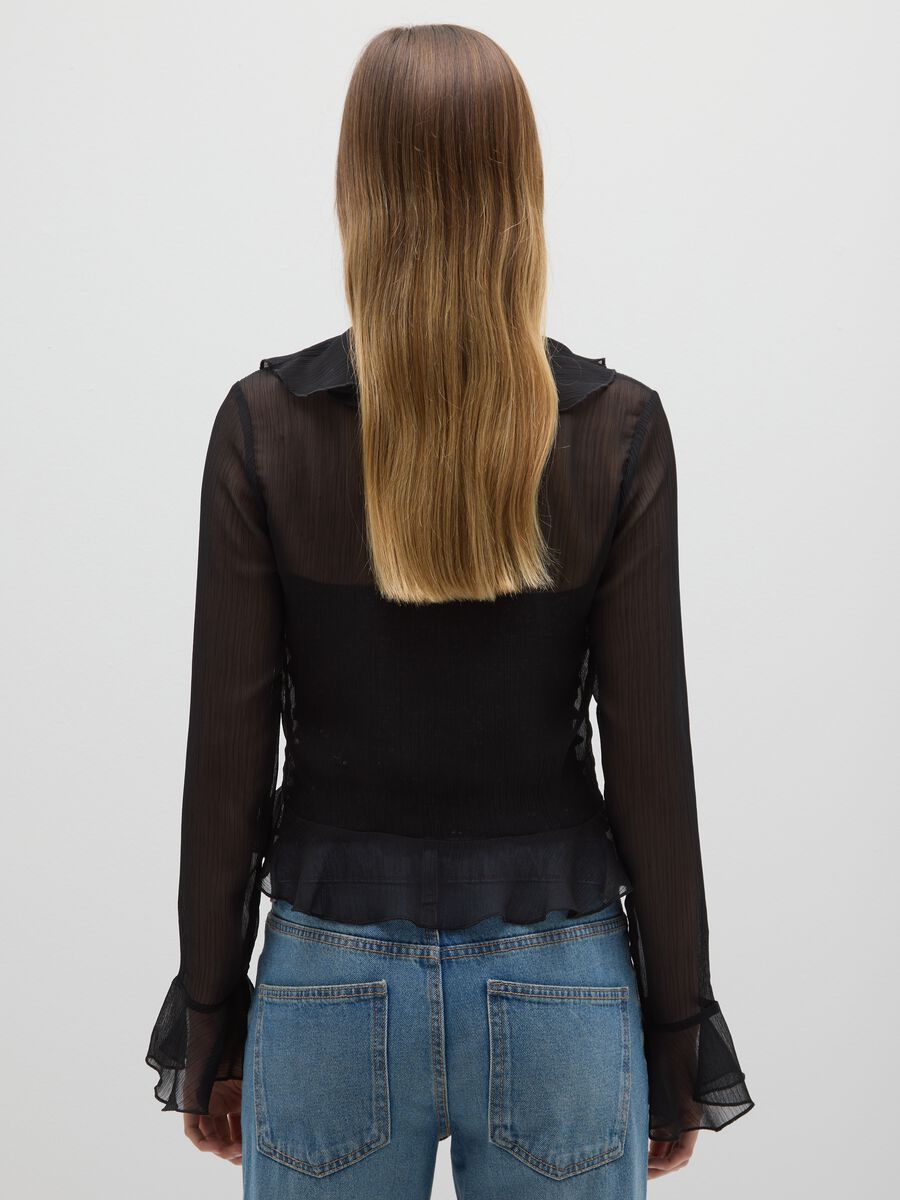 Blusa nero regular fit con volant_2