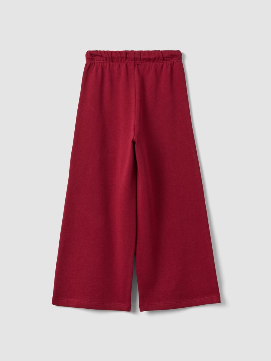 Pantaloni rossi in puro cotone con vita elasticizzata e fiocco per bambina_1