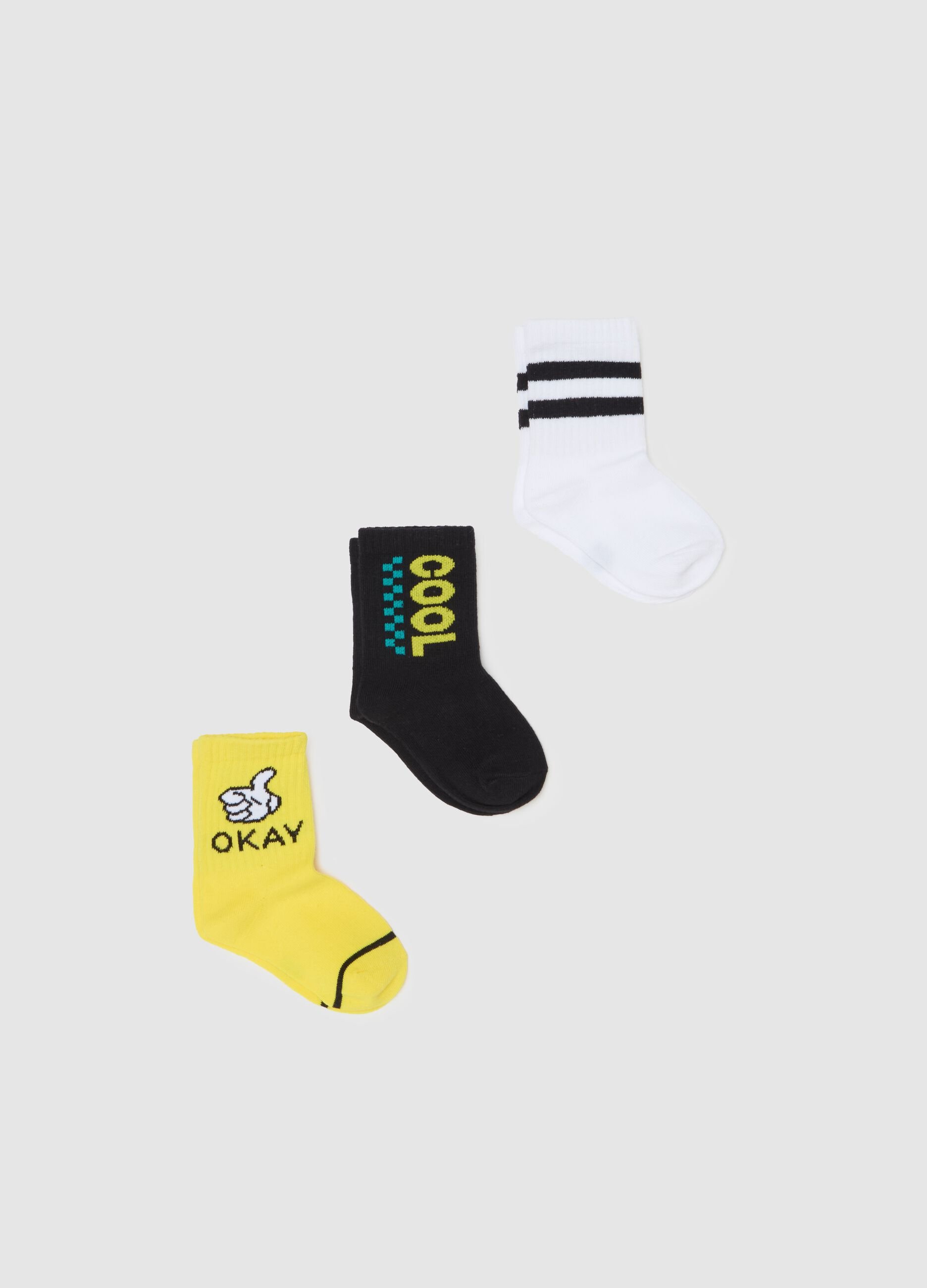 Three-pair pack tennis socks with okay design