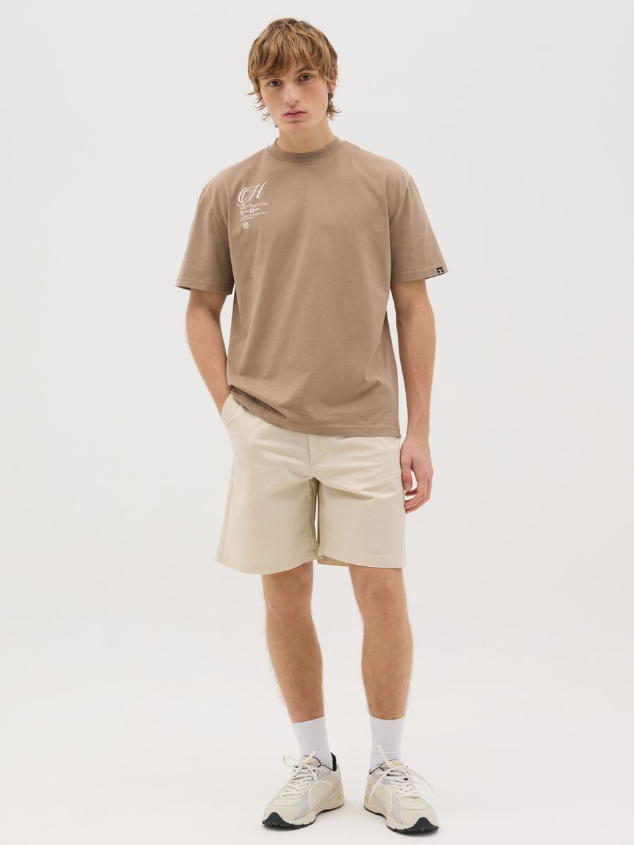 Men’s regular-fit beige shorts in stretch cotton_0