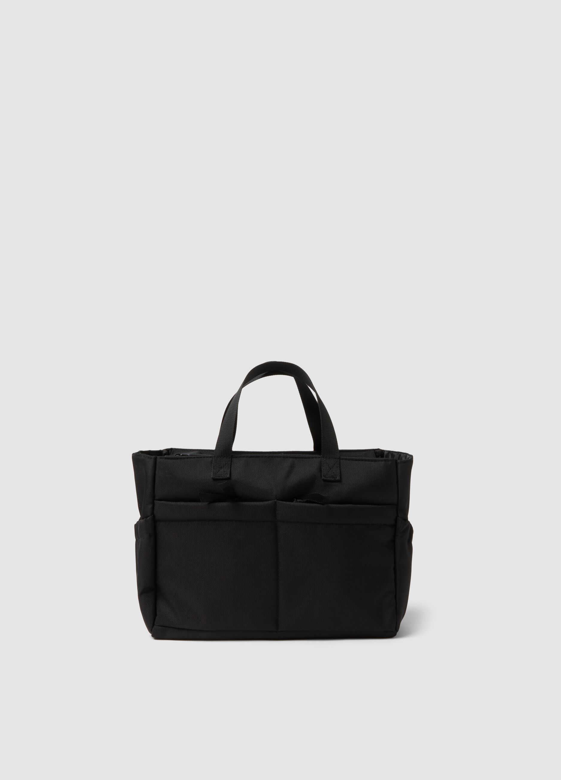 Black handbag with external pockets and double handles