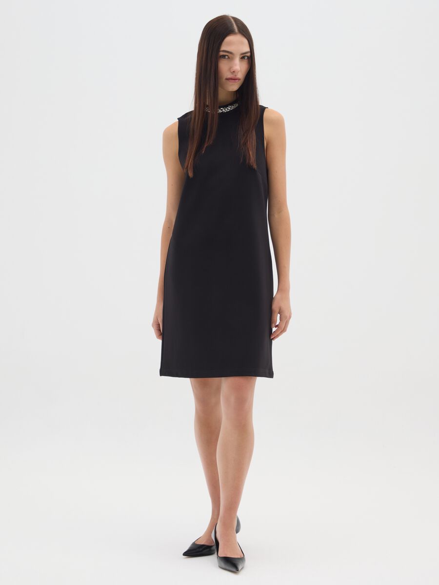 Sleeveless black fitted dress with embellished neckline_0