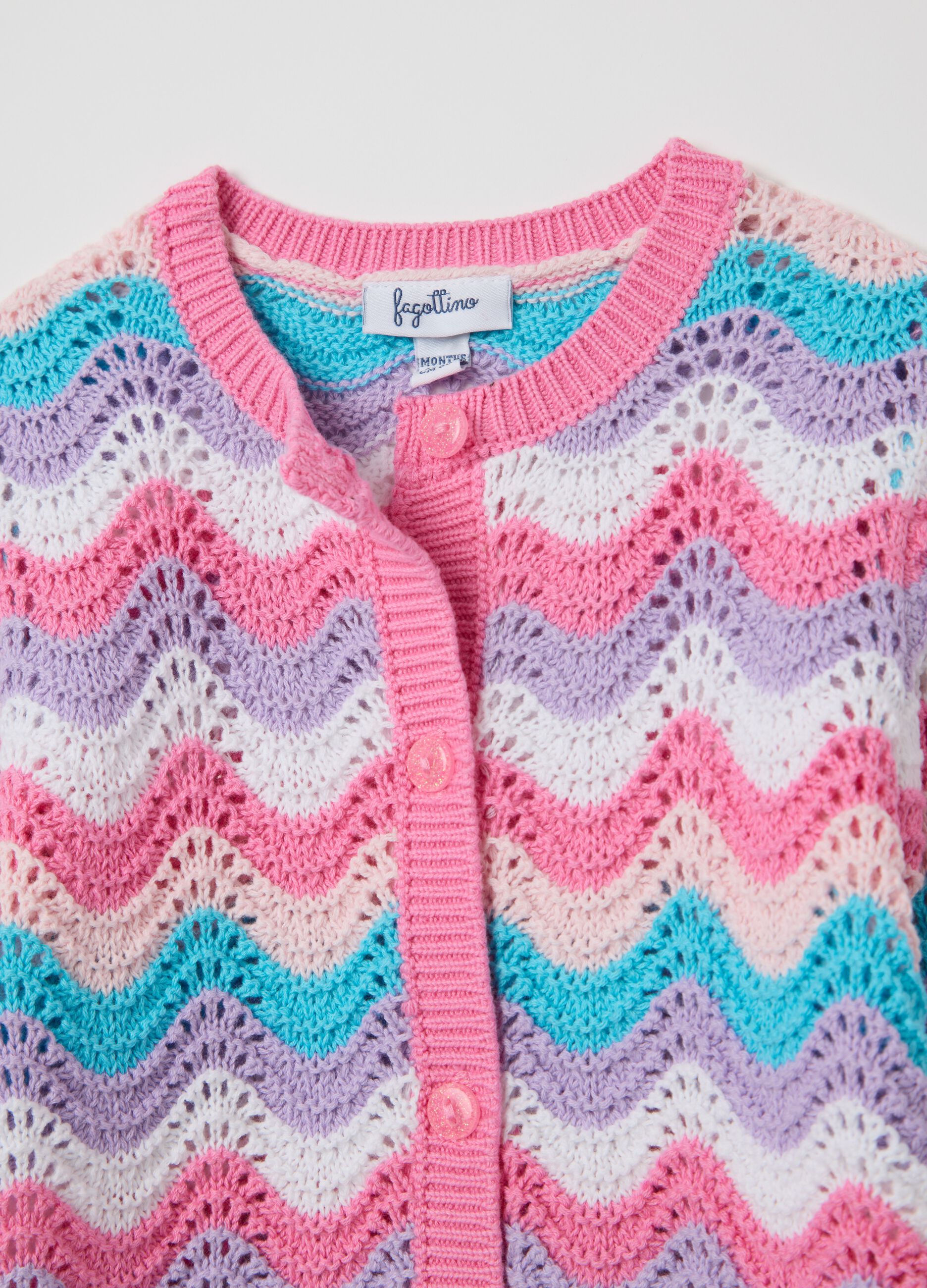 Pink and light blue cardigan with striped openwork design