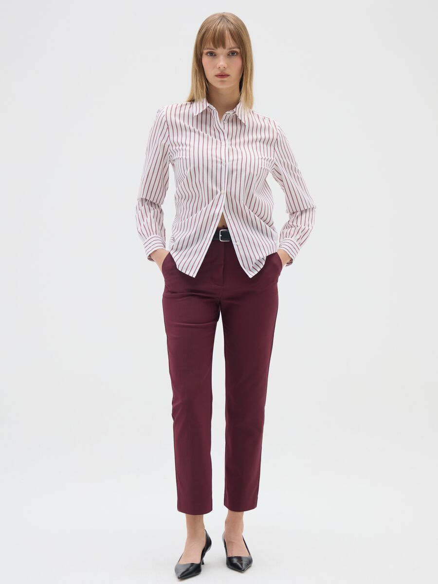 Slim violet trousers in stretchy fabric_0