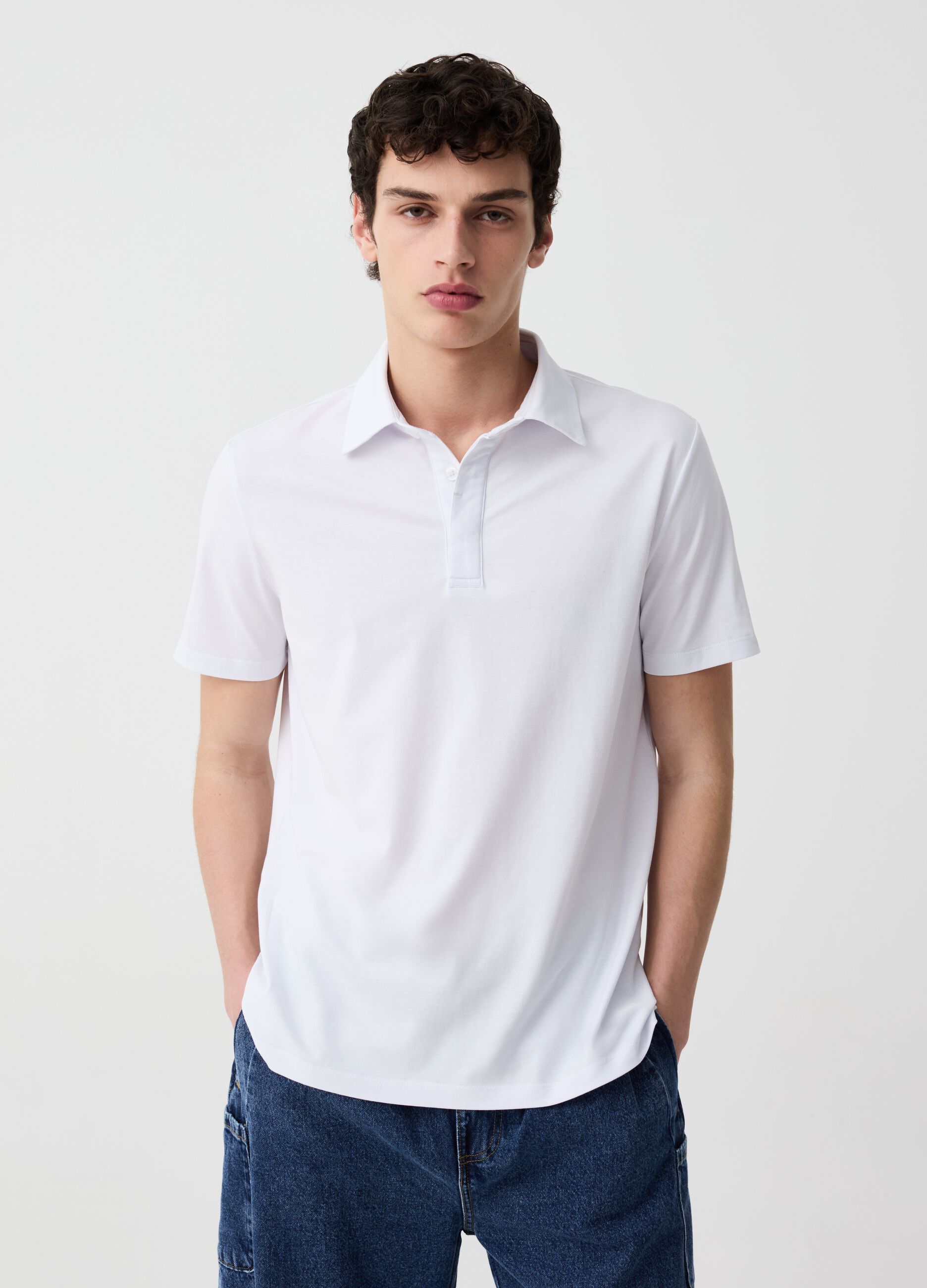 Active solid colour polo shirt