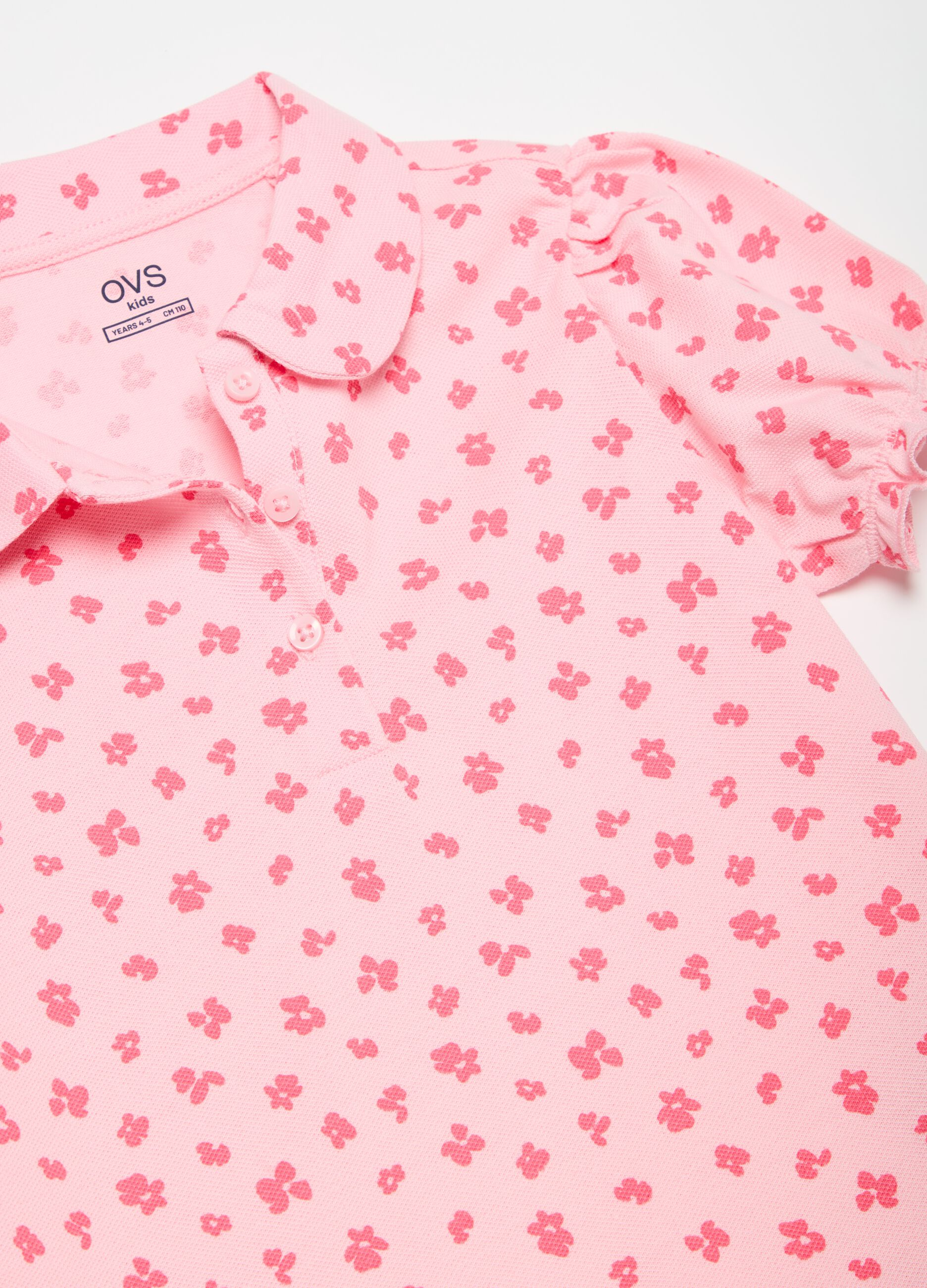 Polo con stampa a fiorellini all-over