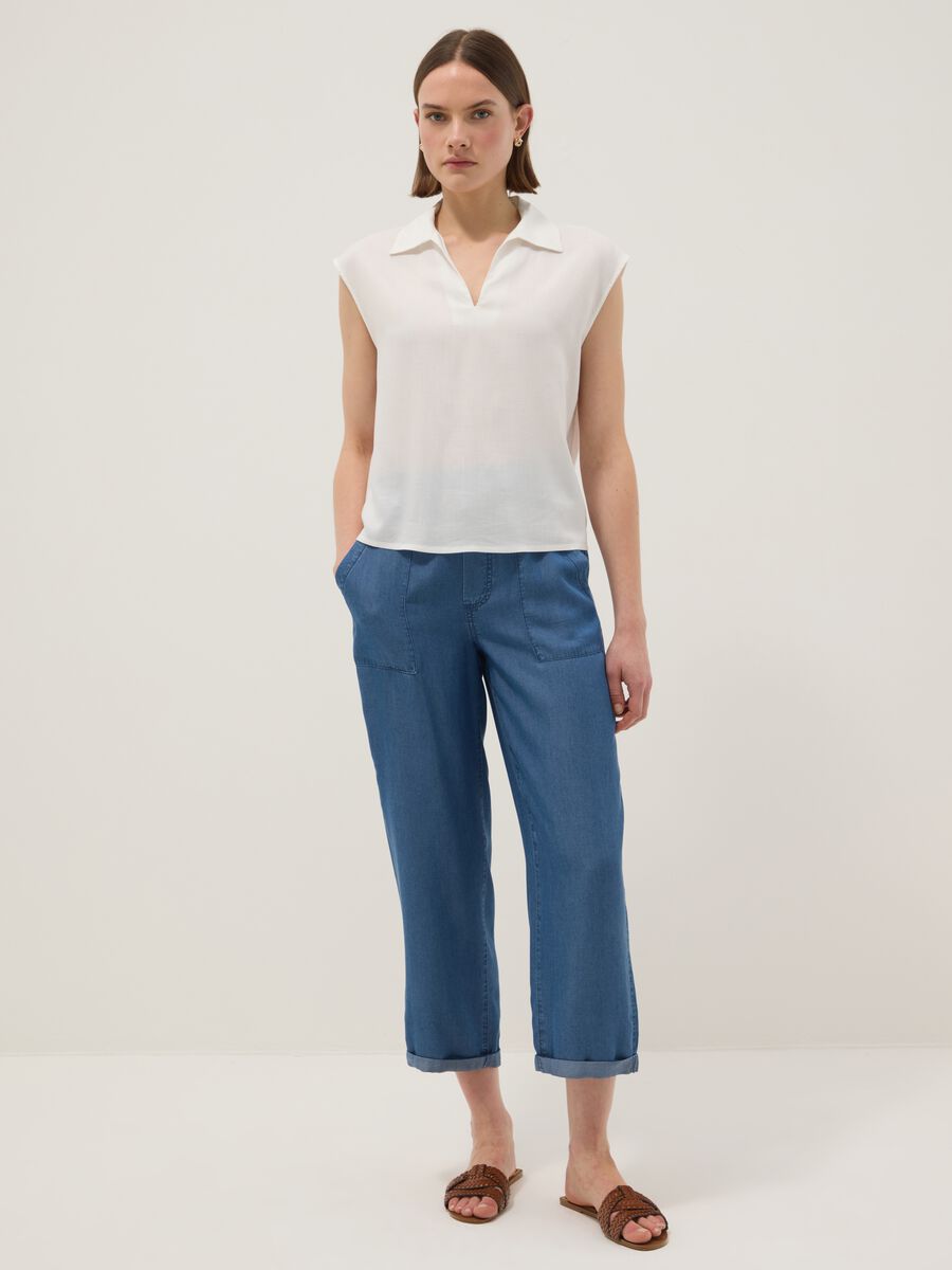 Light blue denim jeans in 100% lyocell with elasticated waist, relaxed fit_0