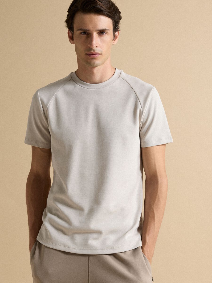 T-shirt grigia in misto cotone traspirante e ad asciugatura rapida_1